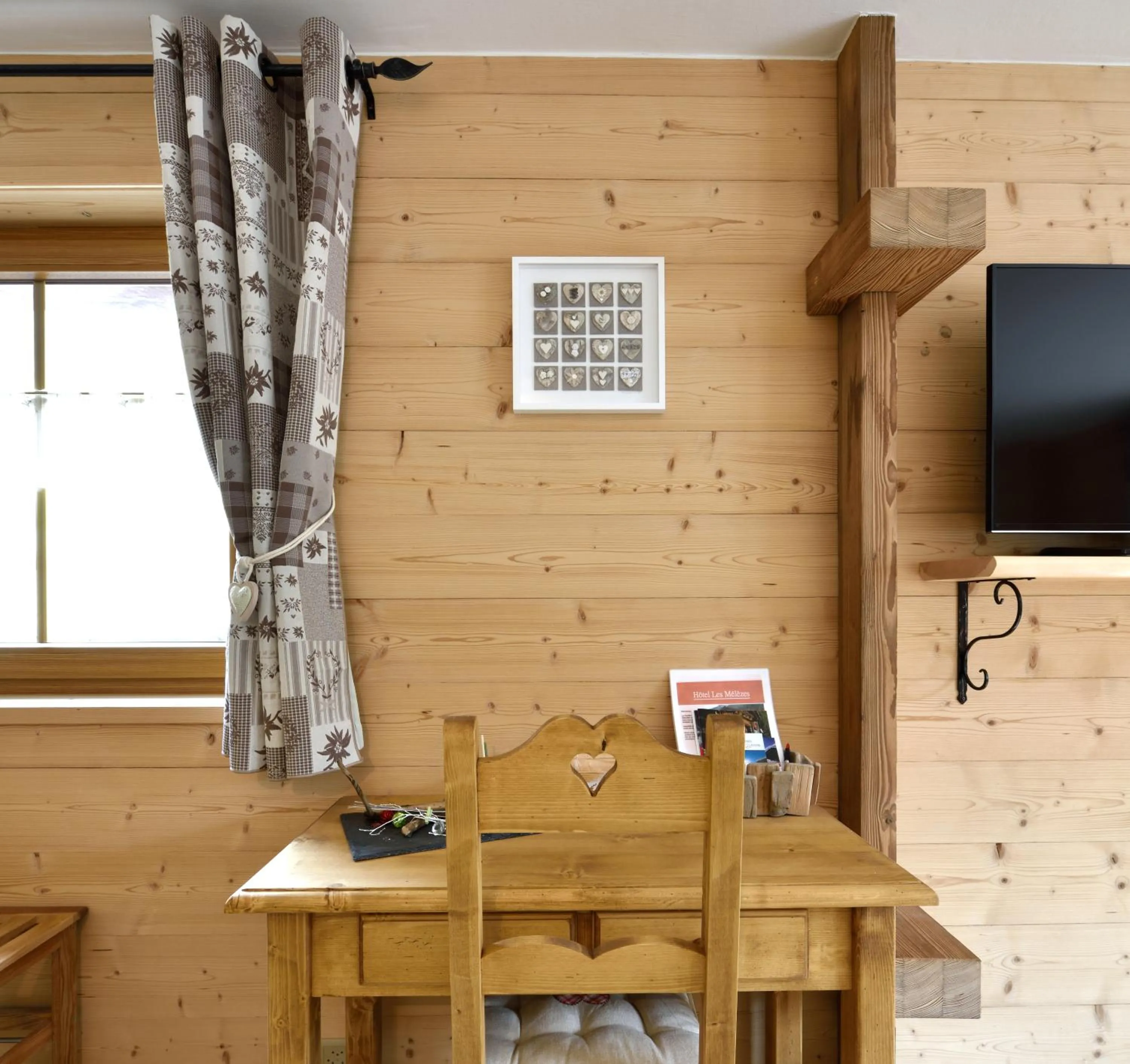 Seating area in Hotel Les Mélèzes