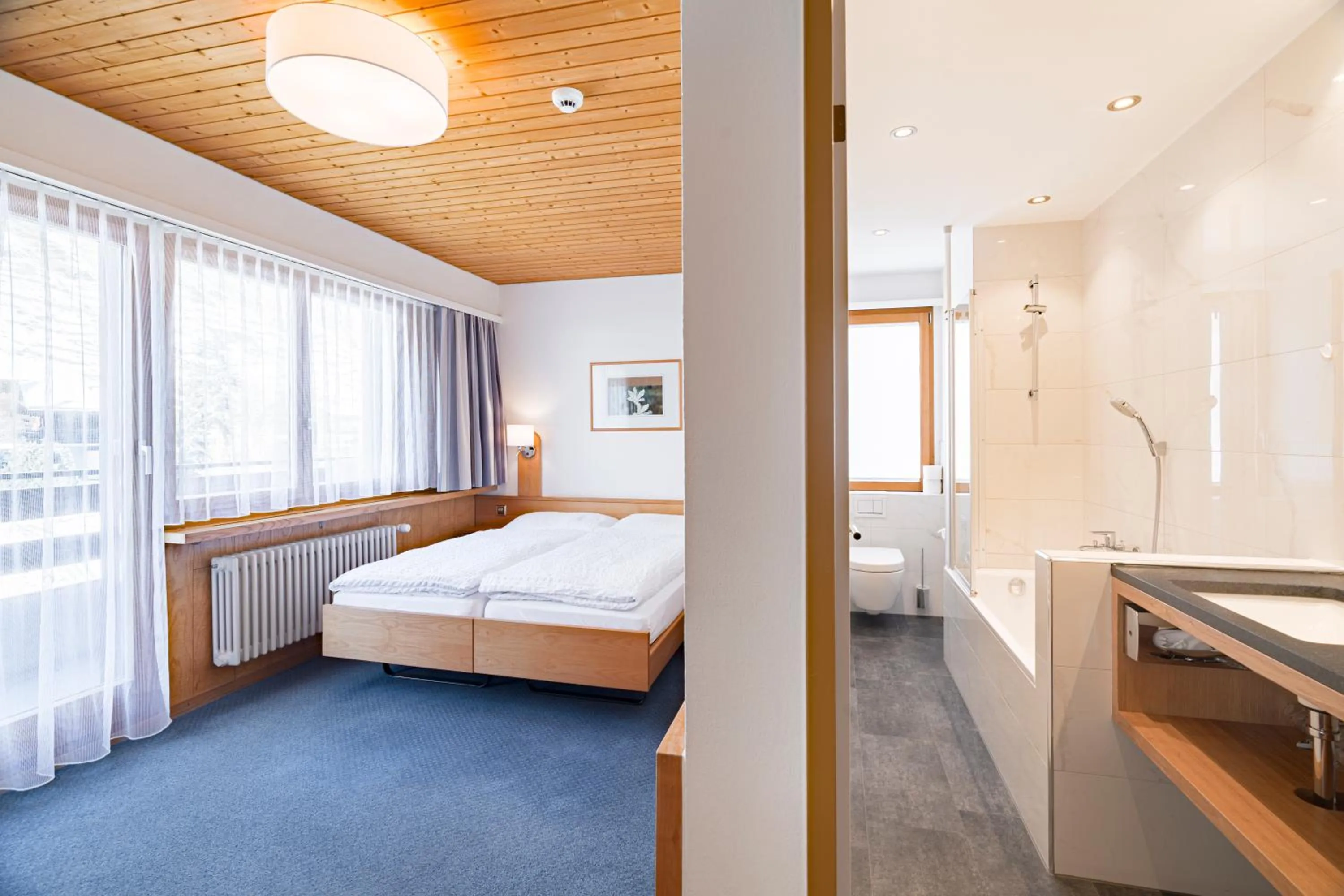 Bed in Hotel Parnass