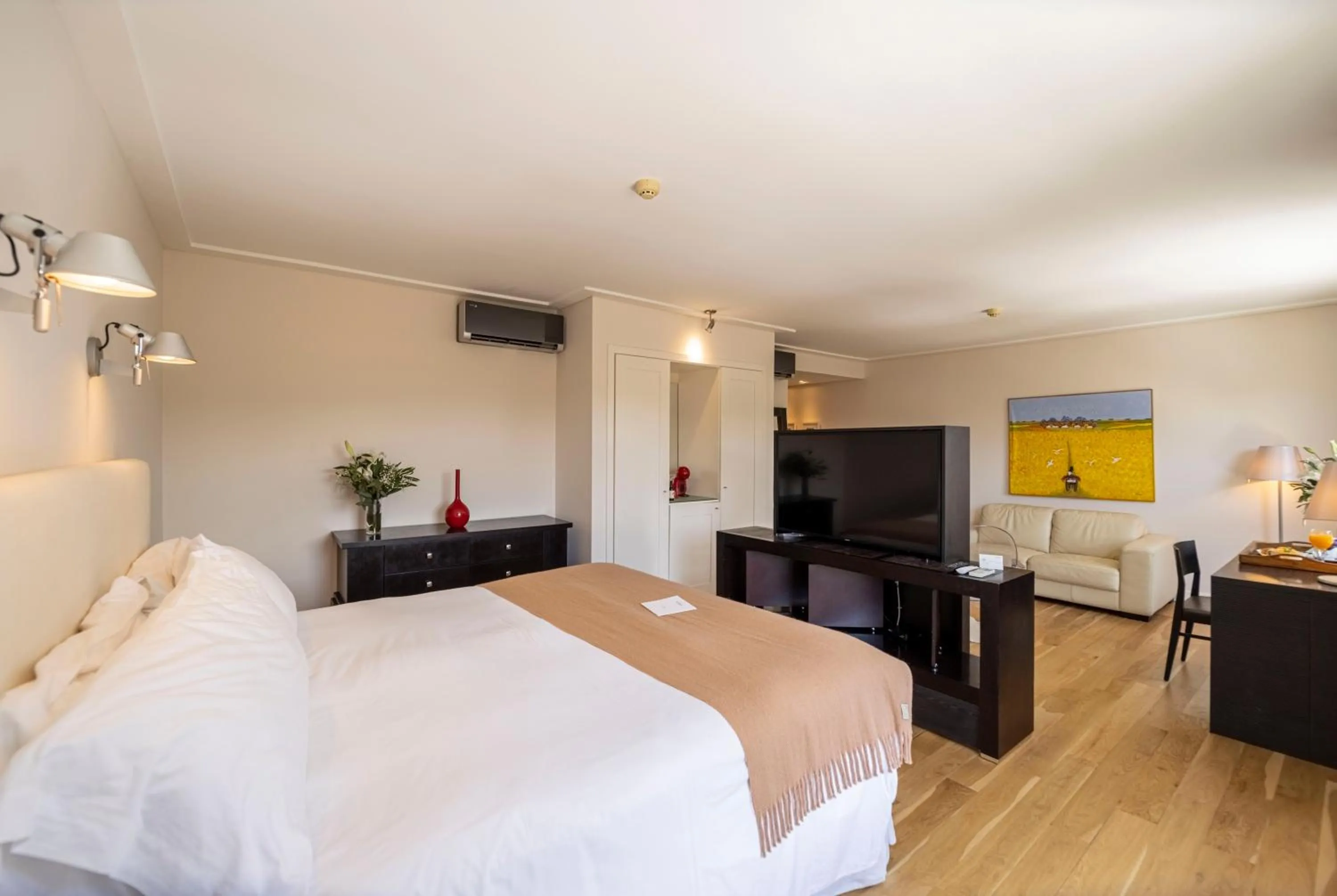 Living room, Bed in AWA Boutique + Design Hotel