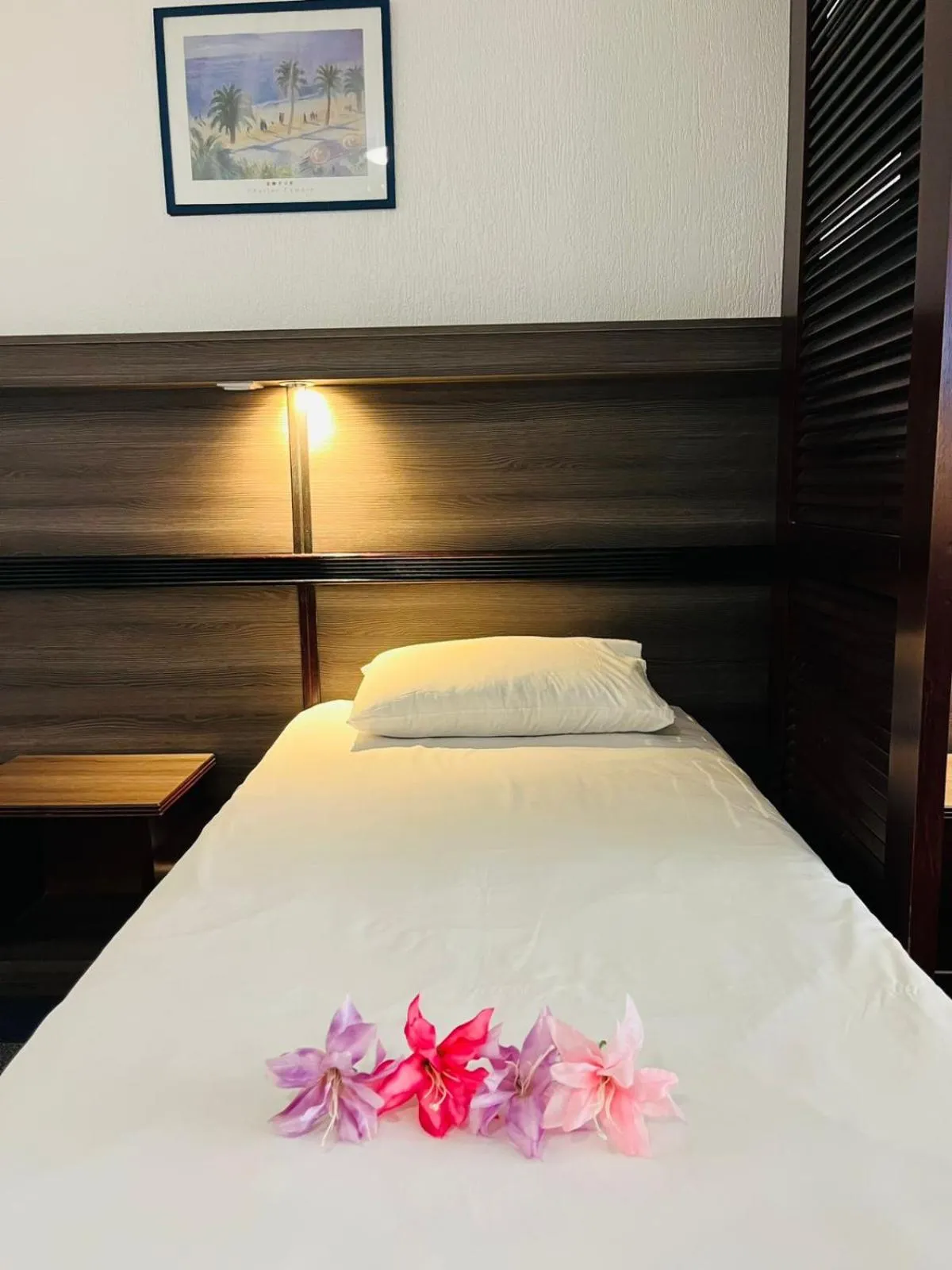 Bed in Hotel Le Paris