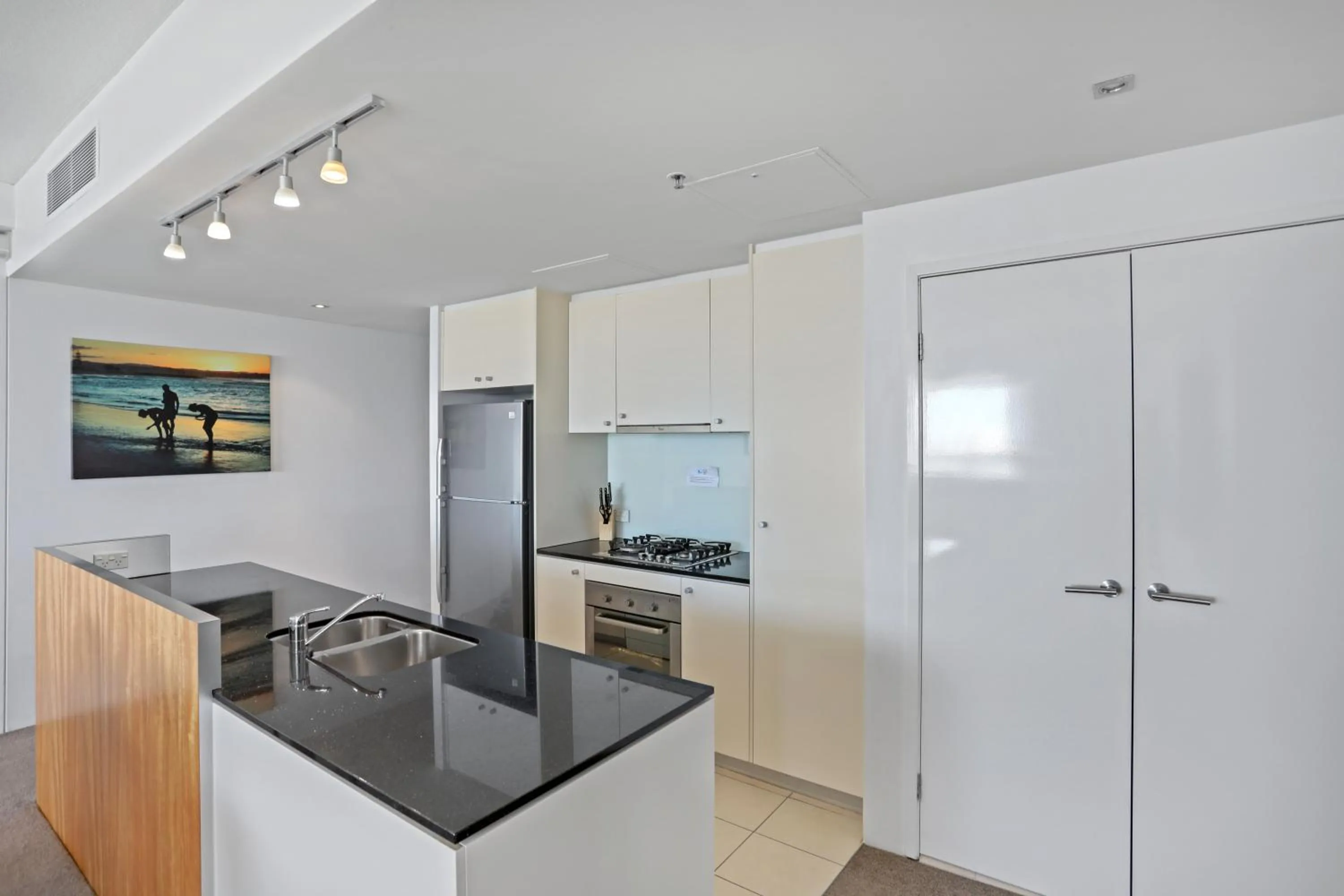 Kitchen or kitchenette in Tweed Ultima Apartments