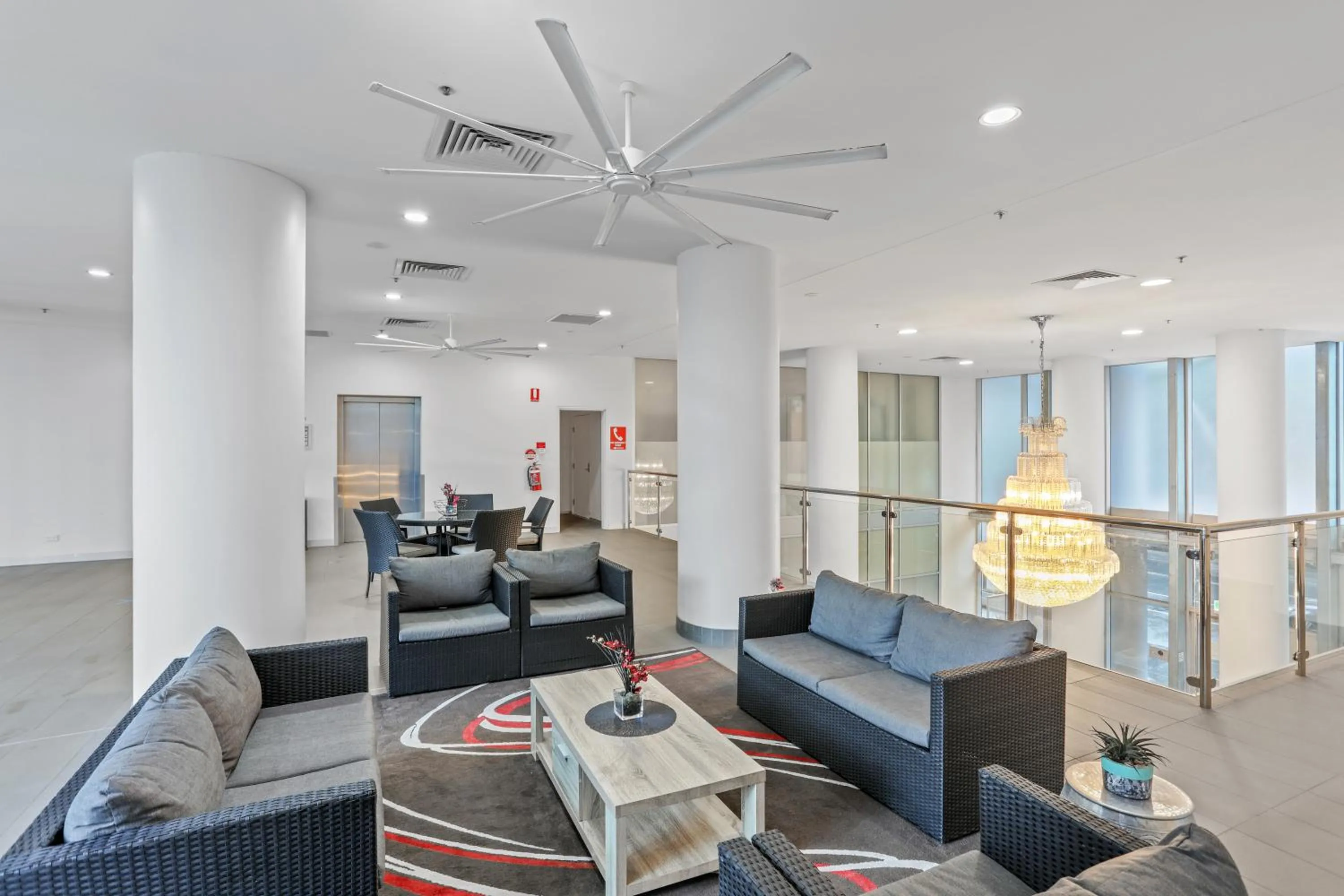 Seating area in Tweed Ultima Apartments