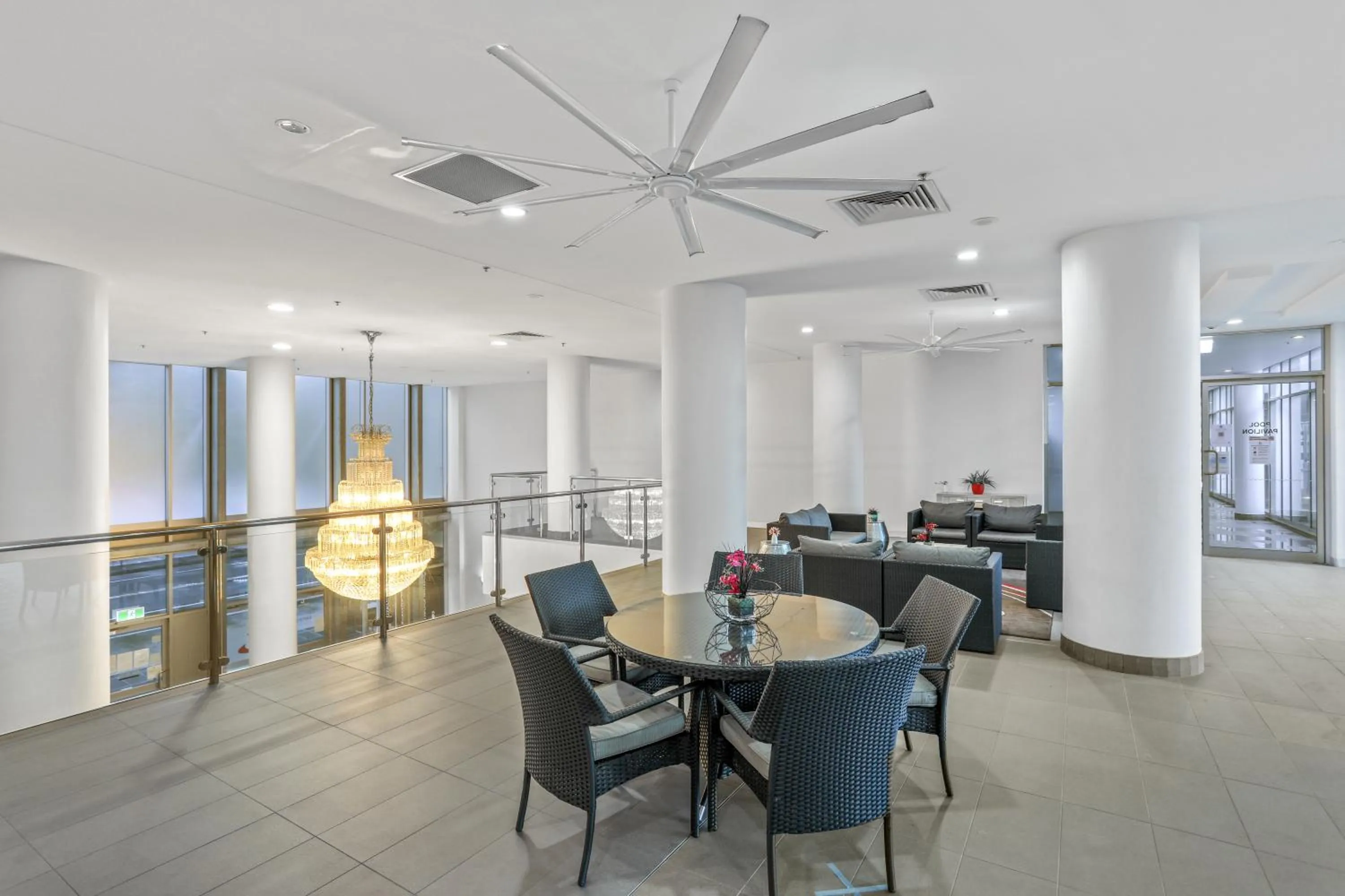 Seating area in Tweed Ultima Apartments