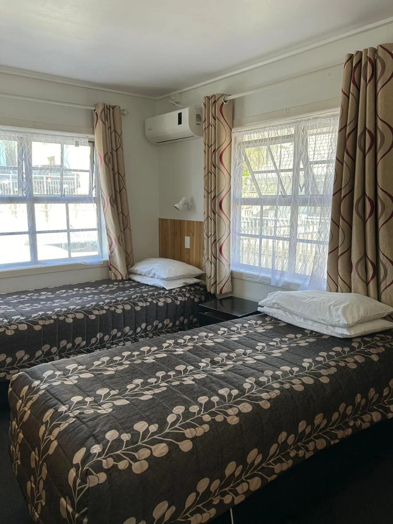 Bed in Tudor Motor Lodge