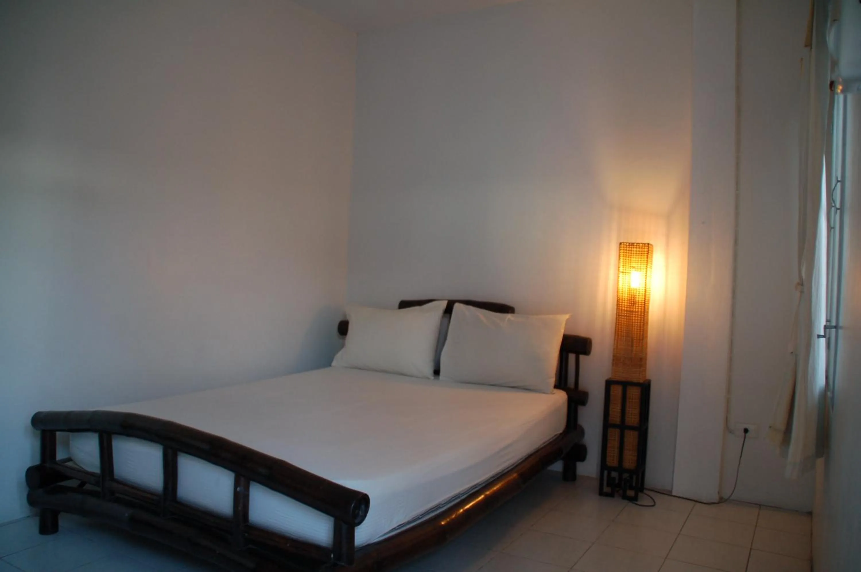 Bed in Lamphuhouse Bangkok