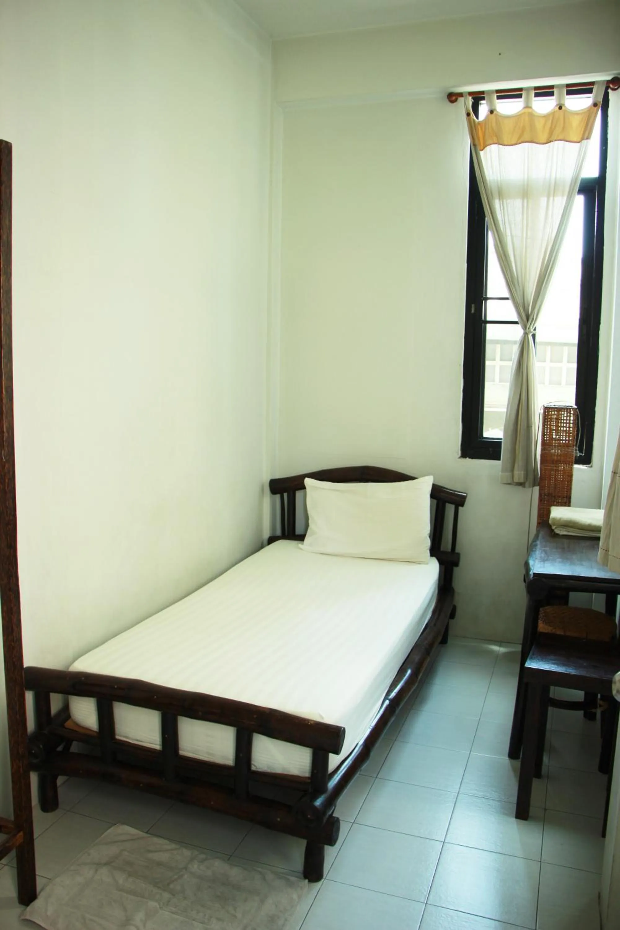 Bed in Lamphuhouse Bangkok