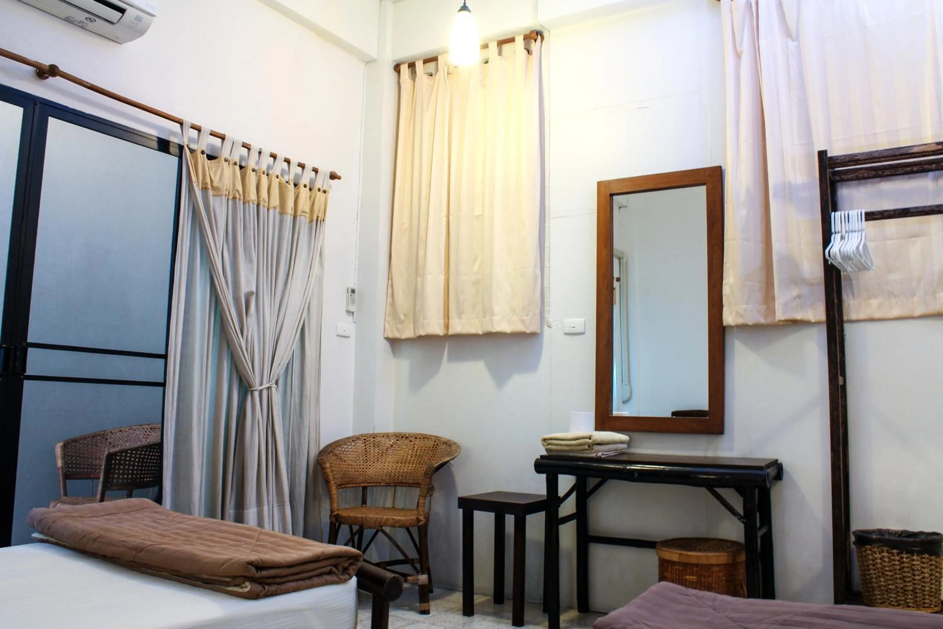 Bed in Lamphuhouse Bangkok