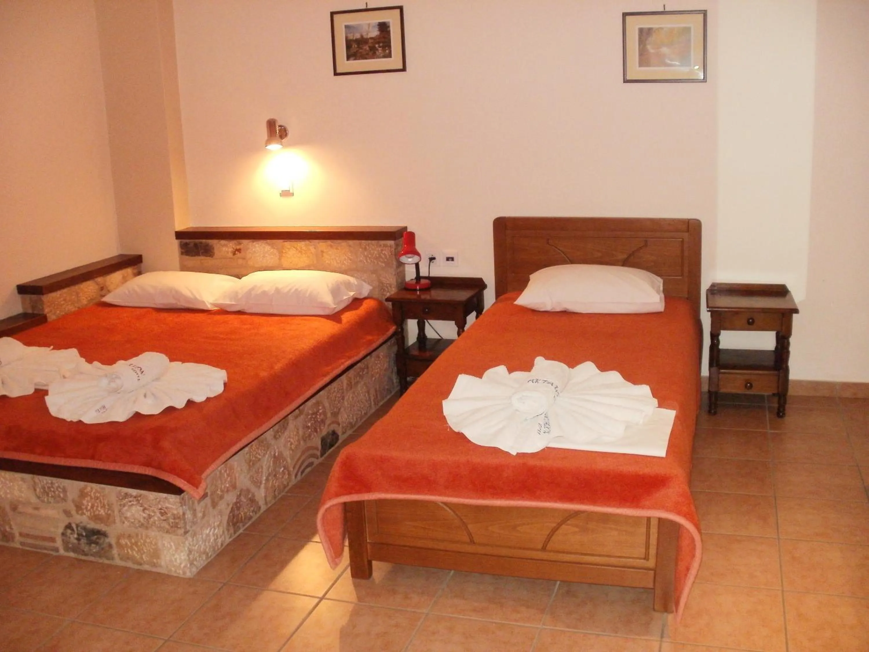 Bed in Aktaion Hotel