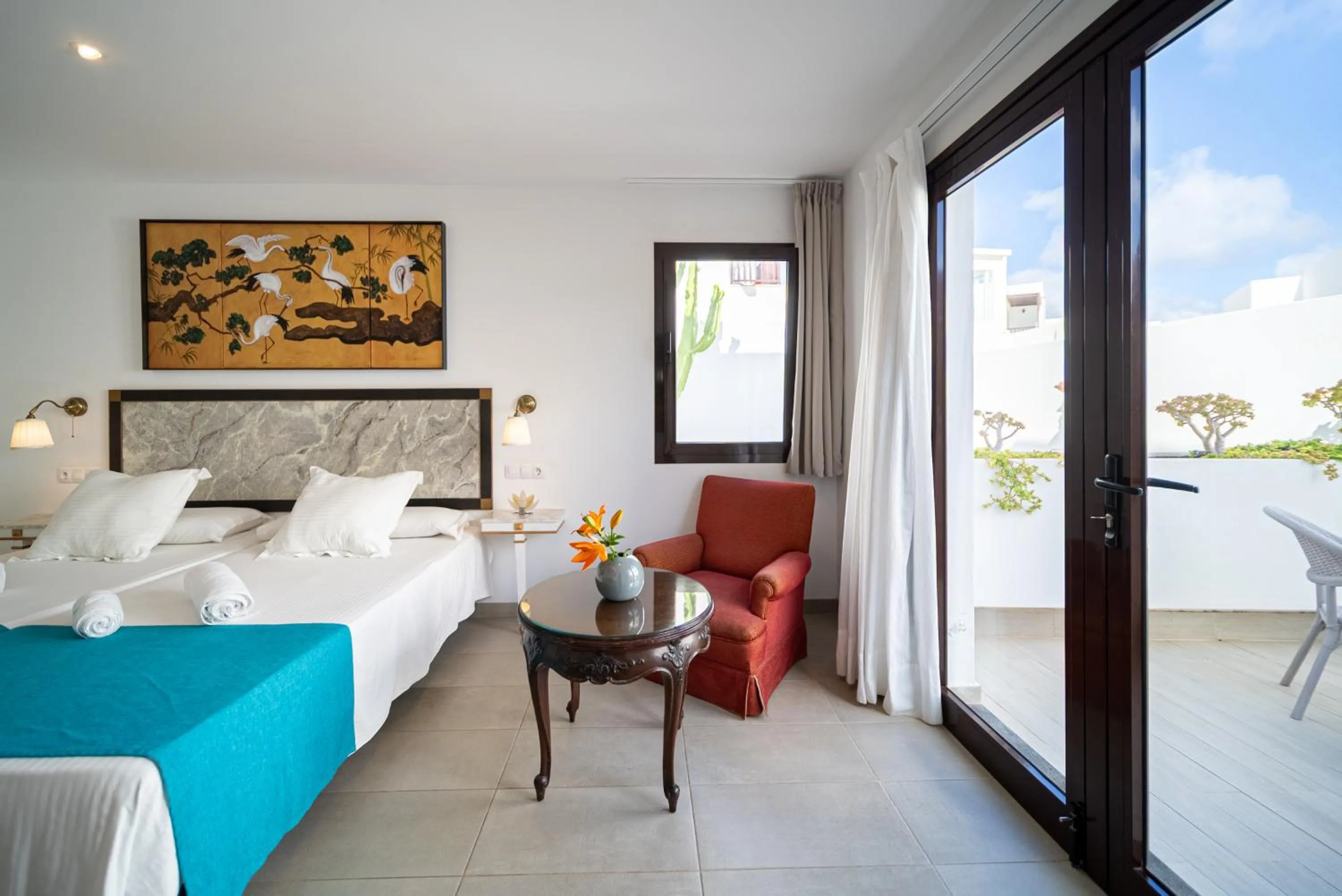 Seating area, Bed in La Casona de Yaiza I Hotel Emblematico