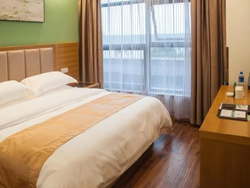 Bed in GreenTree Inn Suzhou Industrial Park Shengpu Town Xinsheng Road Express Hotel