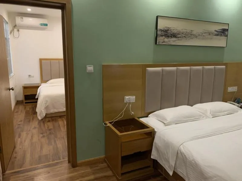 Bed in GreenTree Inn Suzhou Industrial Park Shengpu Town Xinsheng Road Express Hotel