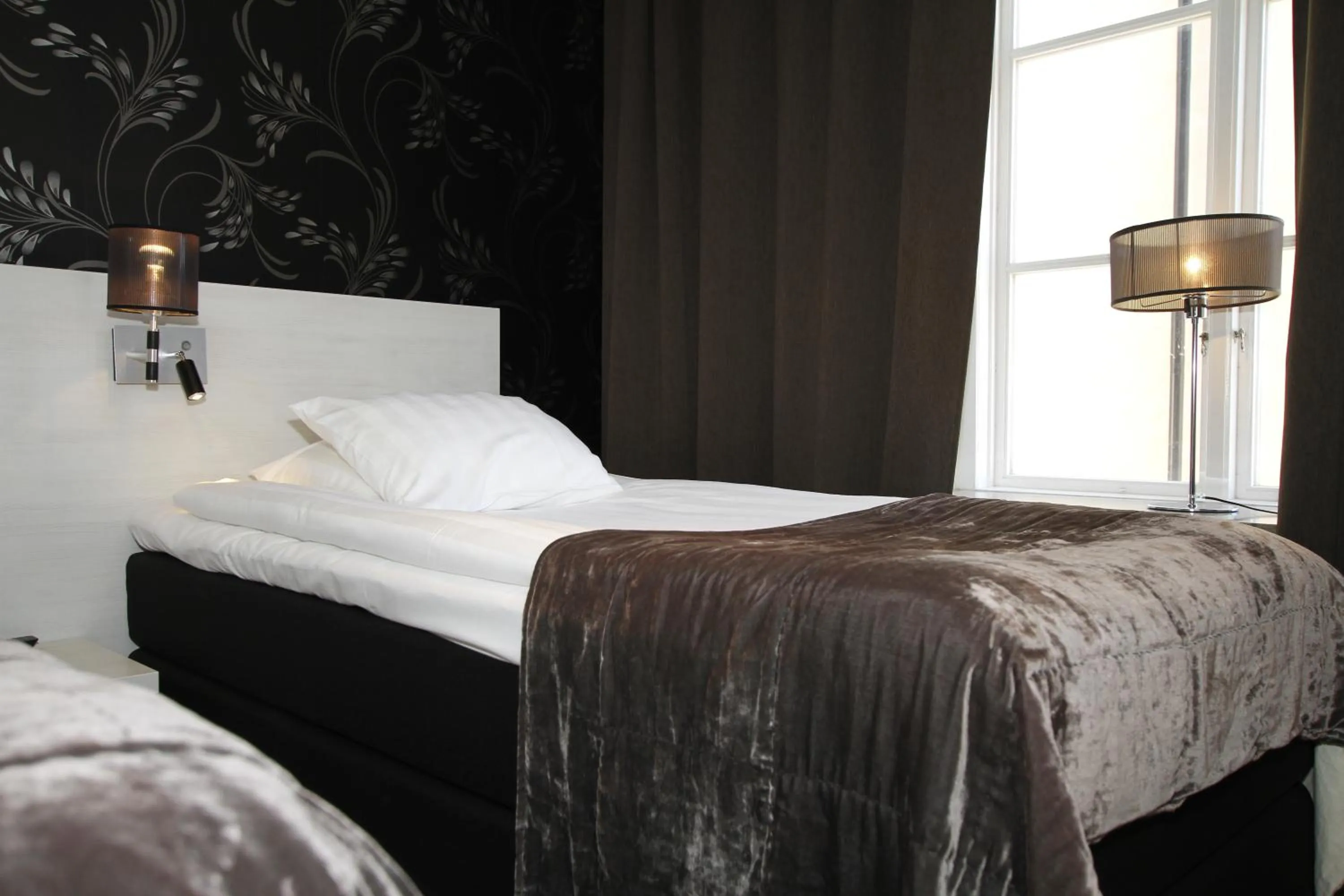 Bedroom, Bed in Donners Hotell