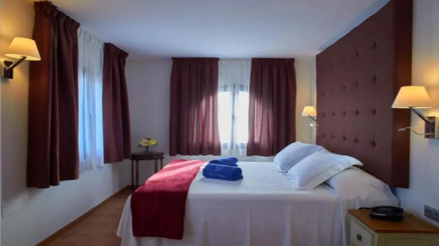 Photo of the whole room, Bed in Paloma Blanca Boutique Hotel