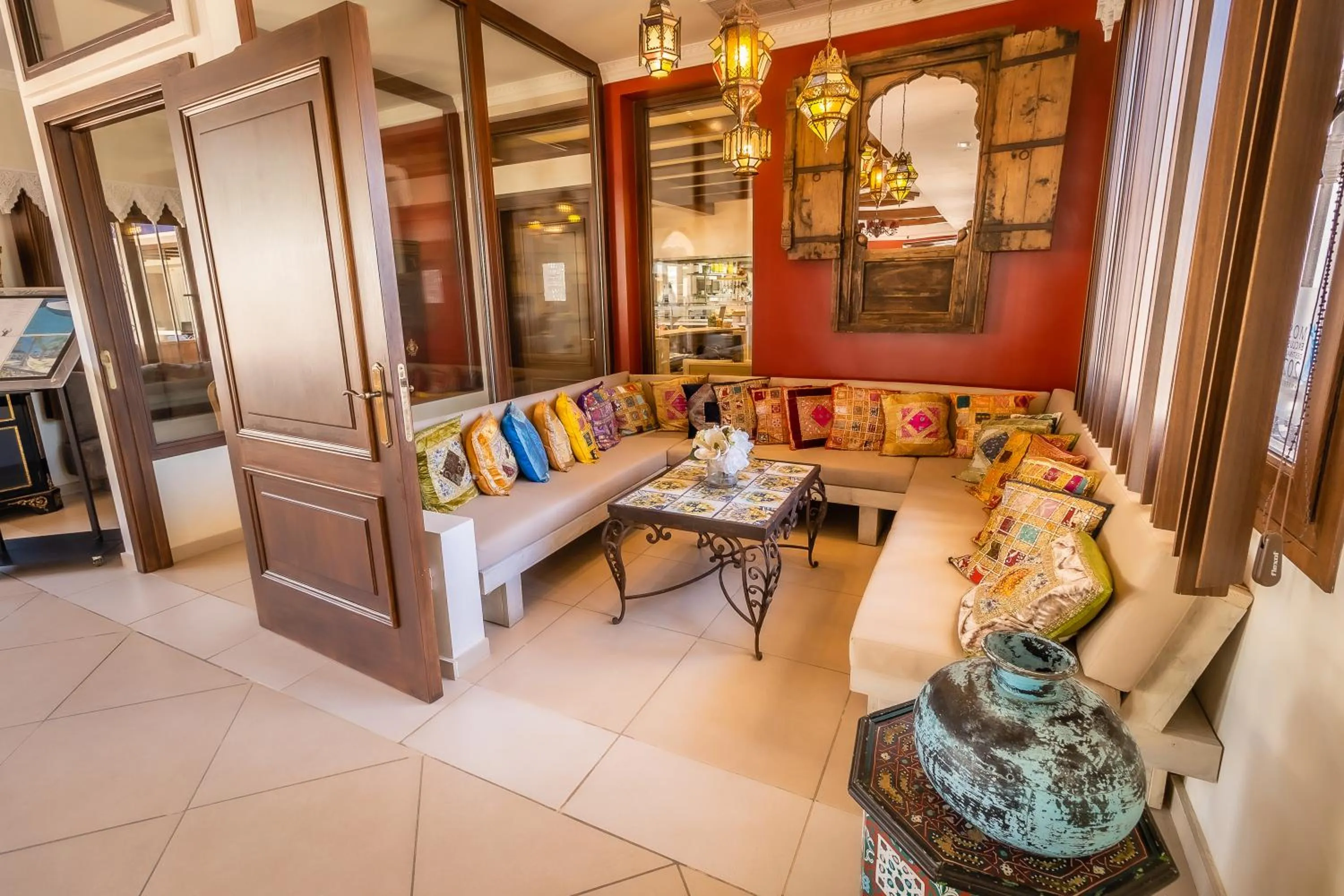 Living room in Paloma Blanca Boutique Hotel