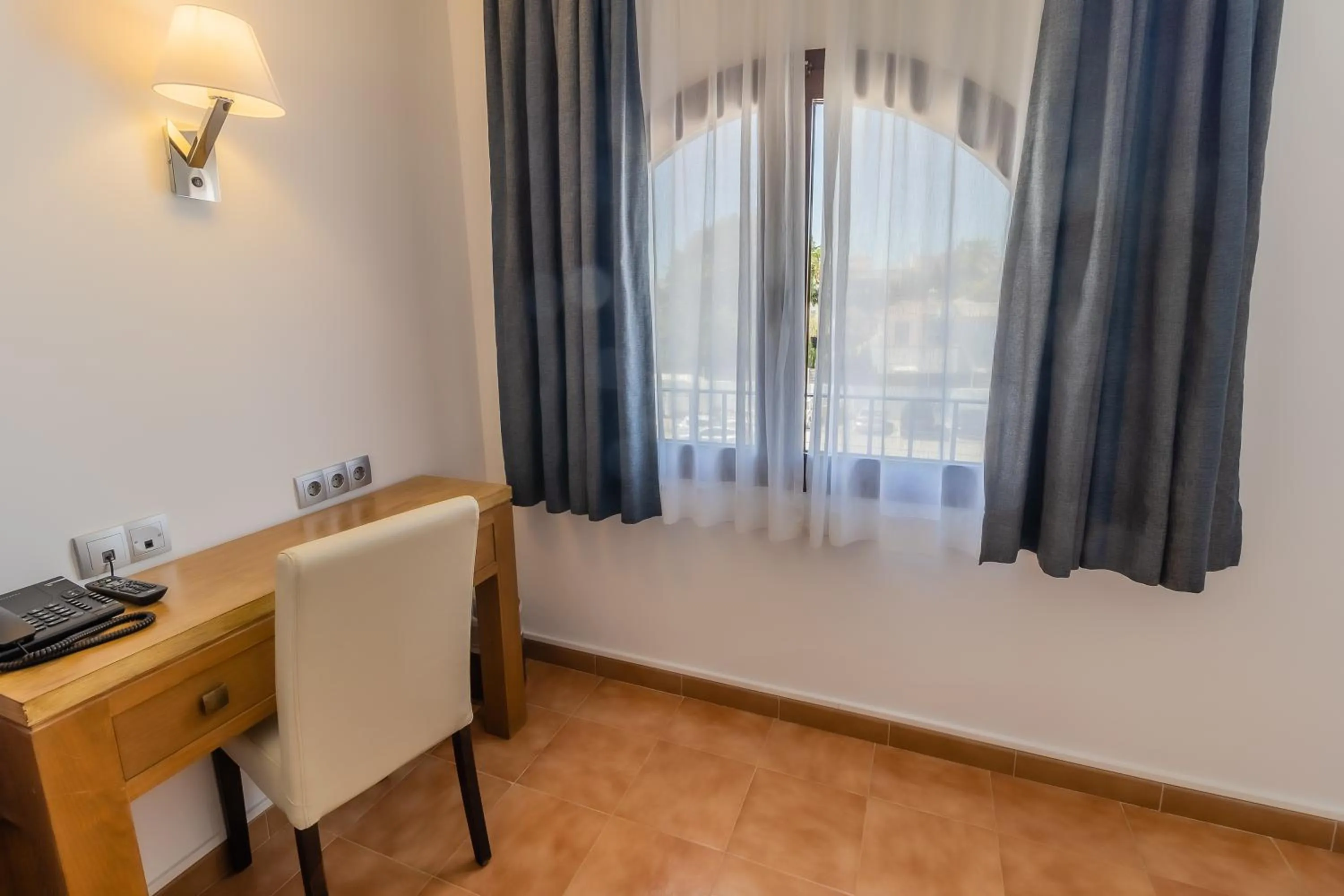 Bedroom in Paloma Blanca Boutique Hotel