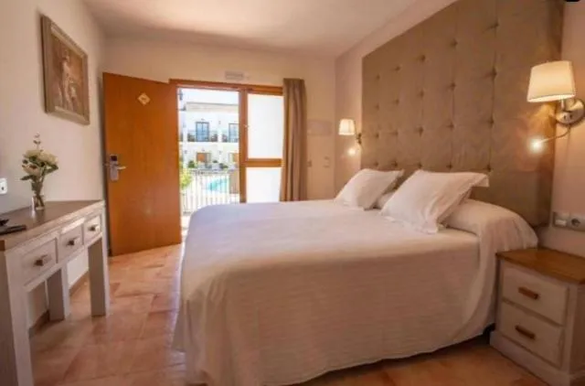 Photo of the whole room, Bed in Paloma Blanca Boutique Hotel
