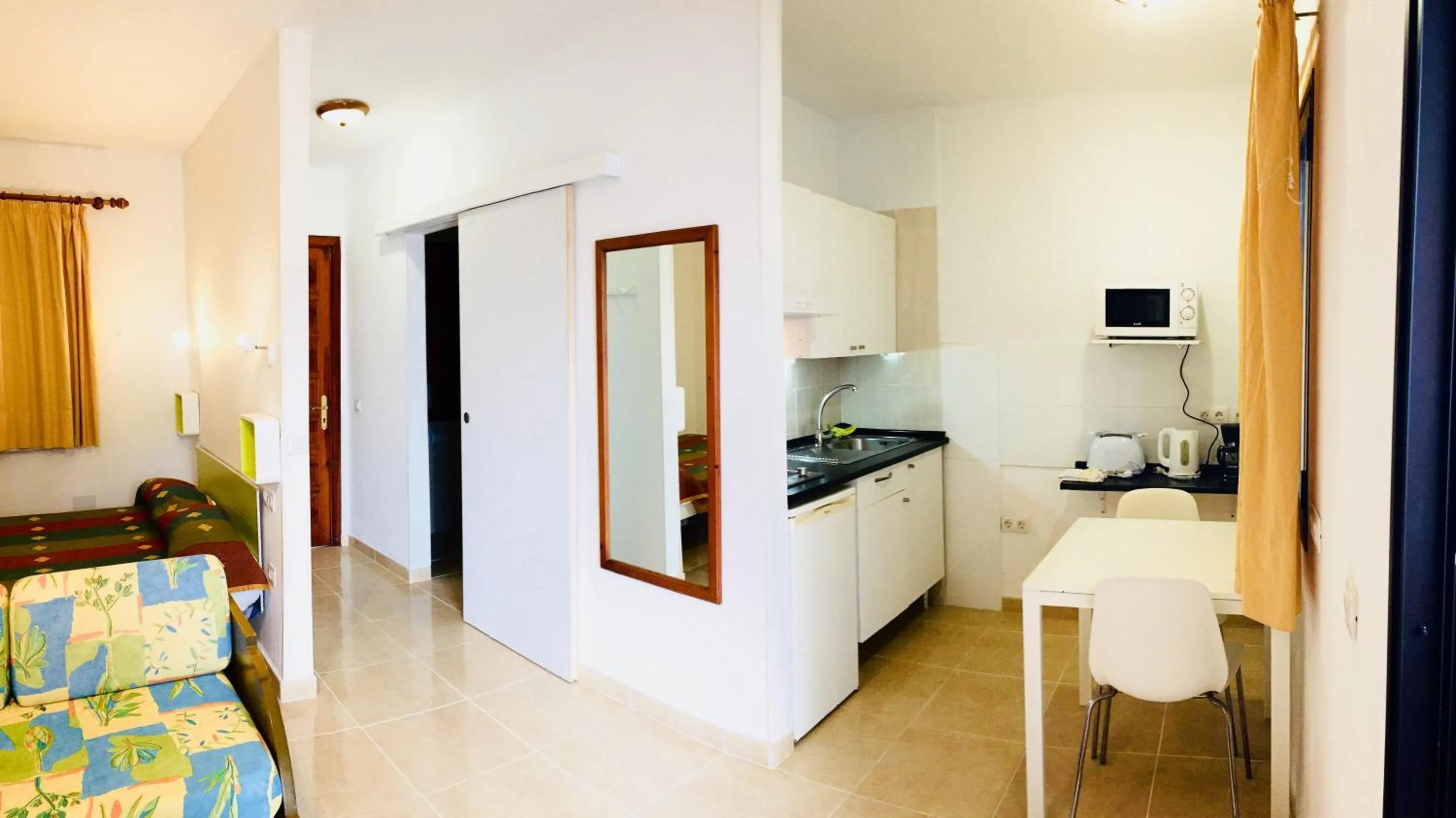 Kitchen or kitchenette in Apartamentos Maribel