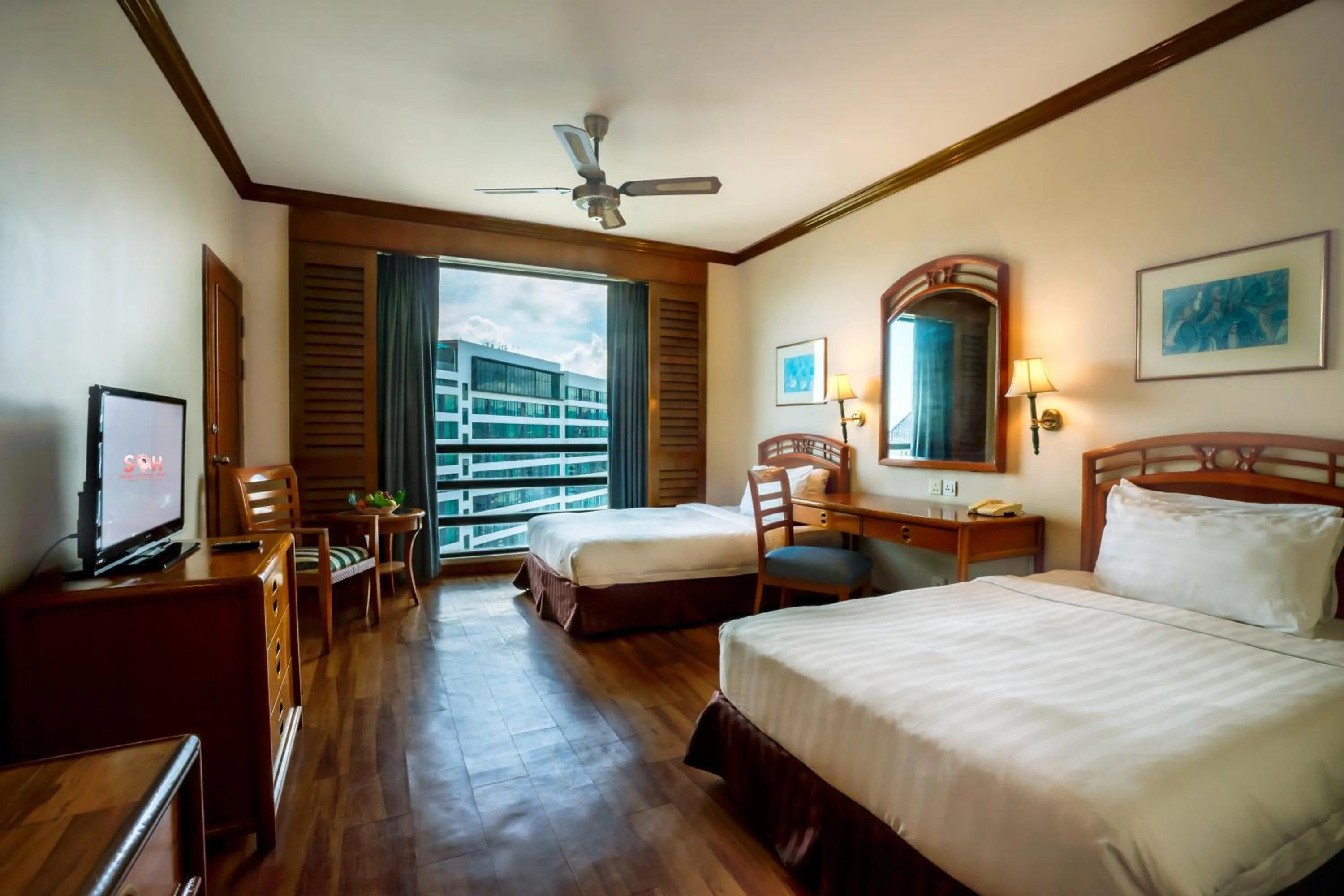 Bed in Sabah Oriental Hotel