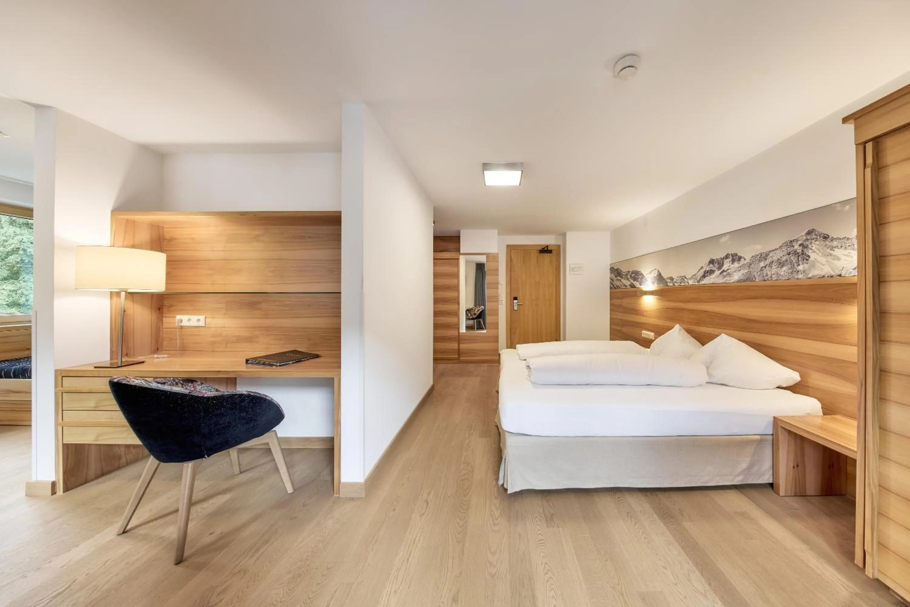 Photo of the whole room, Bed in Quality Hosts Arlberg - Hotel Goldenes Kreuz B&B