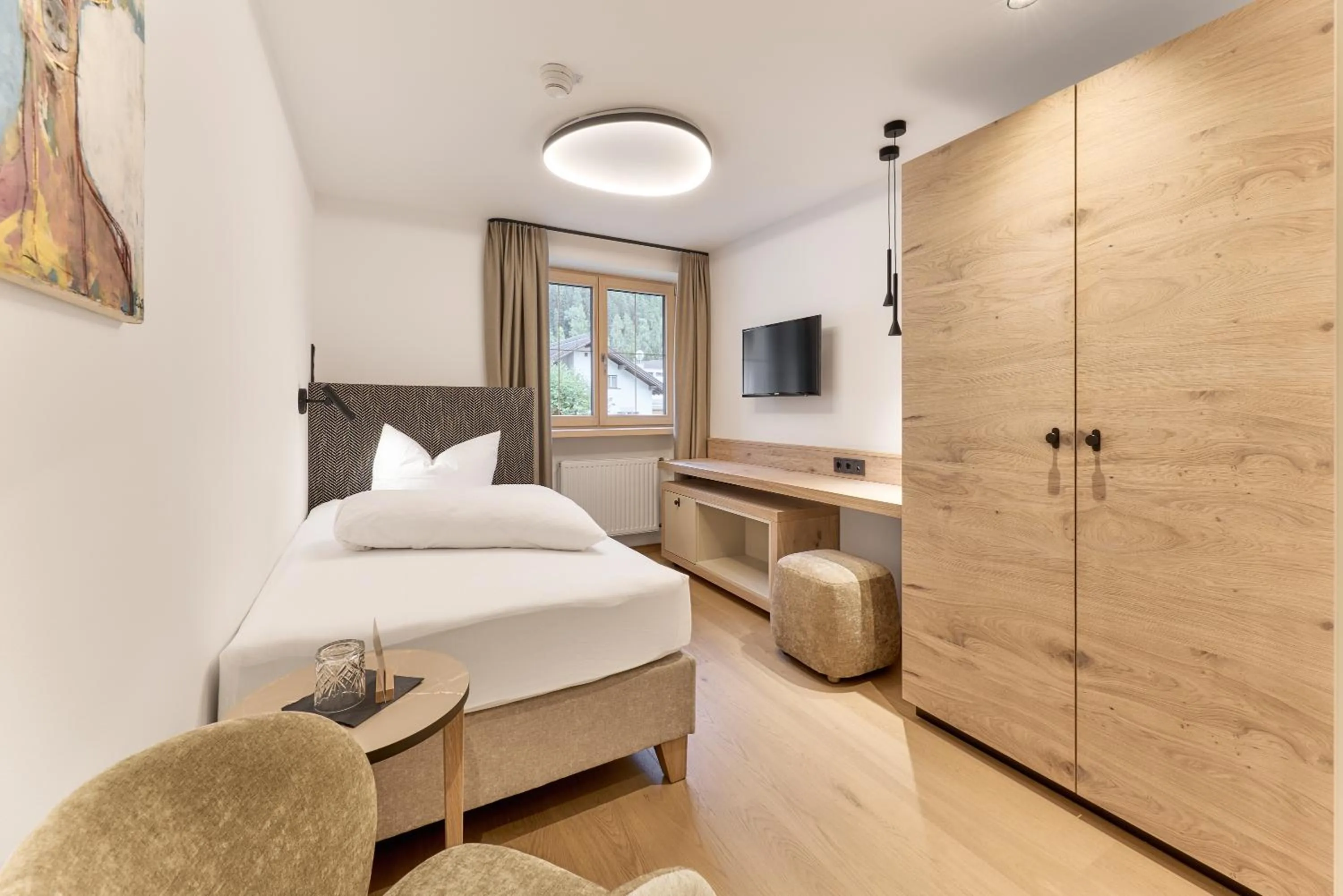 Photo of the whole room, Bed in Quality Hosts Arlberg - Hotel Goldenes Kreuz B&B