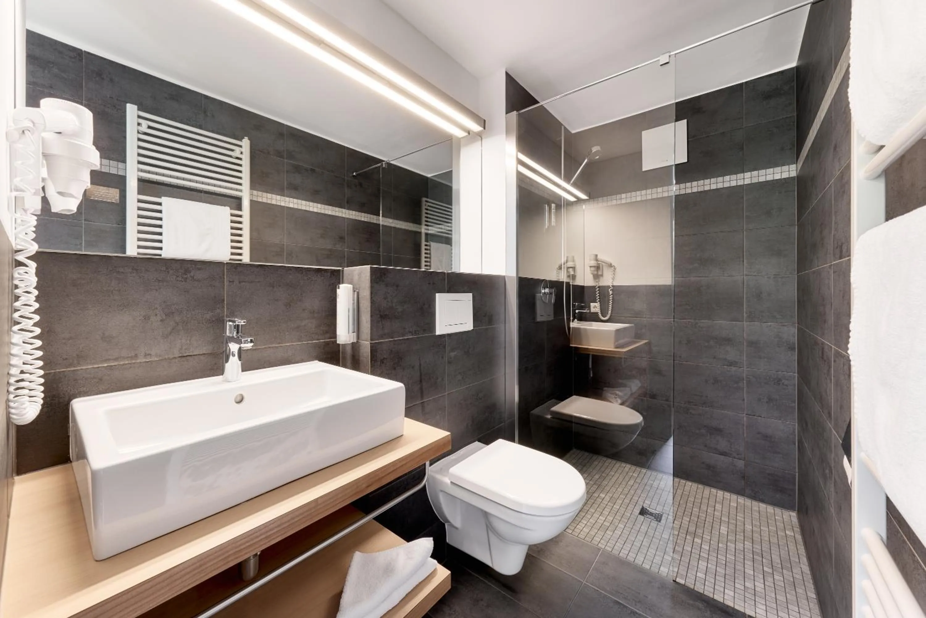 Bathroom in Quality Hosts Arlberg - Hotel Goldenes Kreuz B&B
