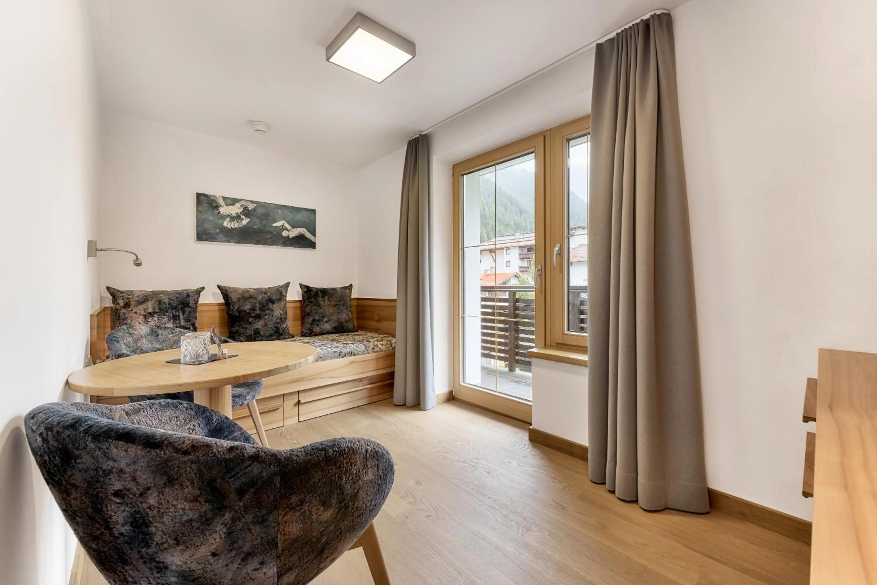 Seating area in Quality Hosts Arlberg - Hotel Goldenes Kreuz B&B