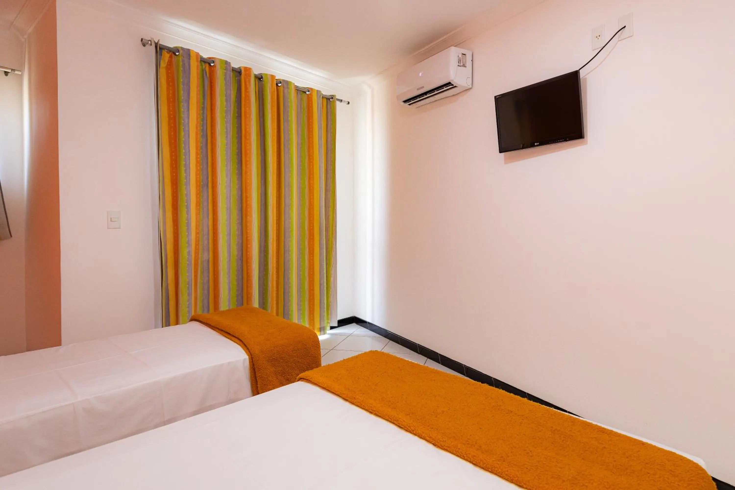 Bed in Hotel Adriattico