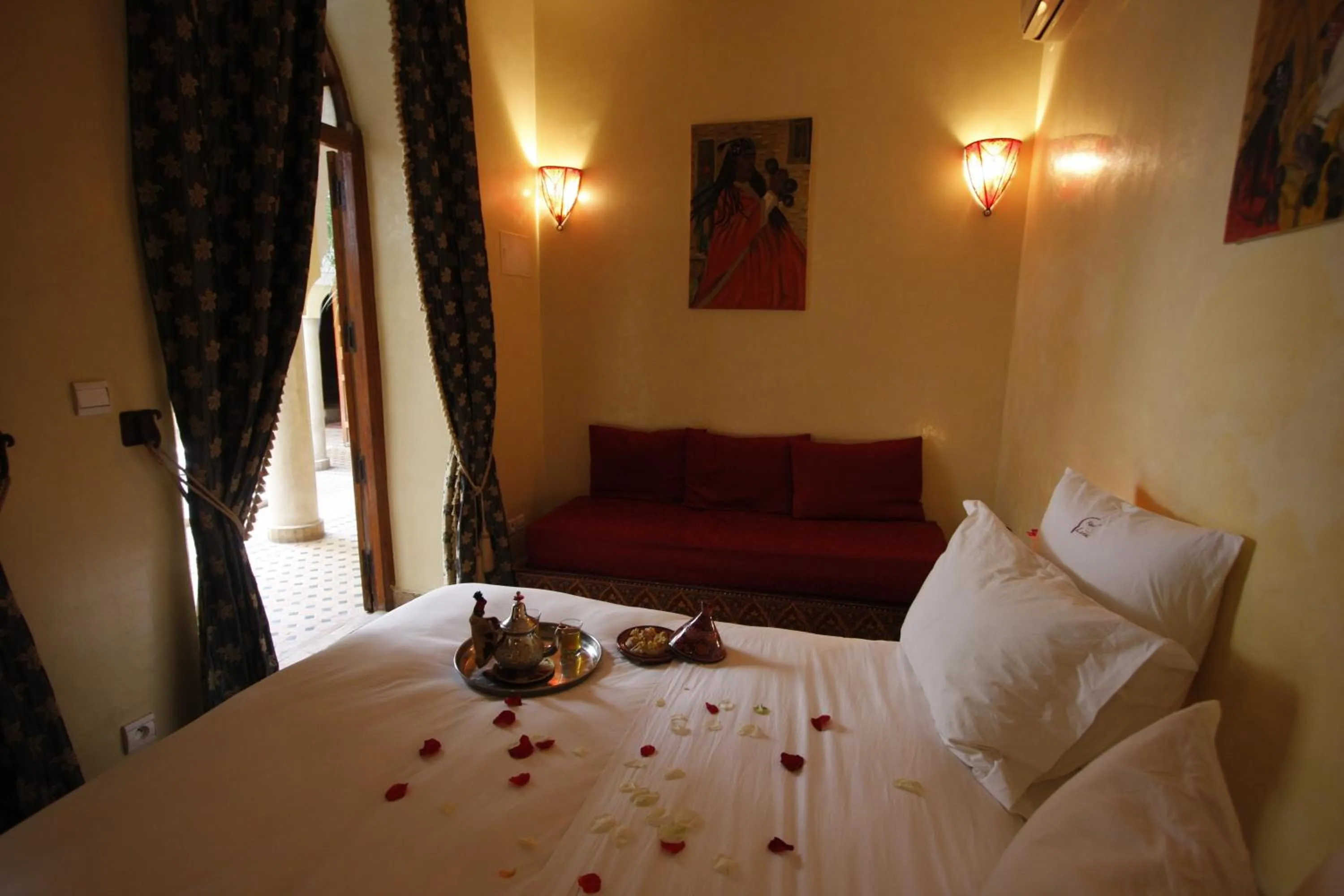 Bed in Riad Léna & Spa