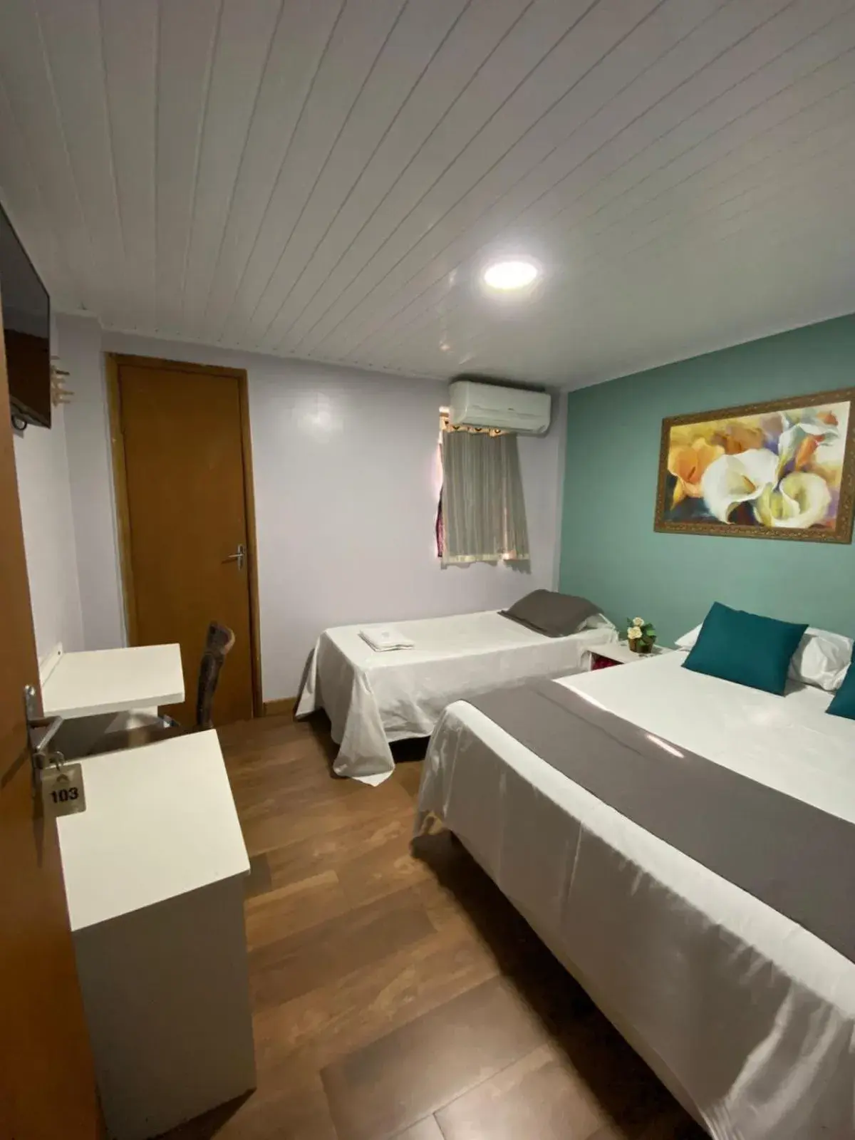 Classic Triple Room in Queiroz Palace Hotel Classic Triple Room in Queiroz Palace Hotel