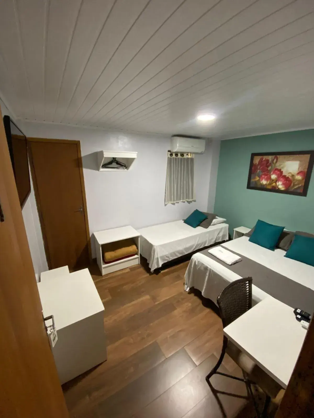 Classic Triple Room in Queiroz Palace Hotel Classic Triple Room in Queiroz Palace Hotel