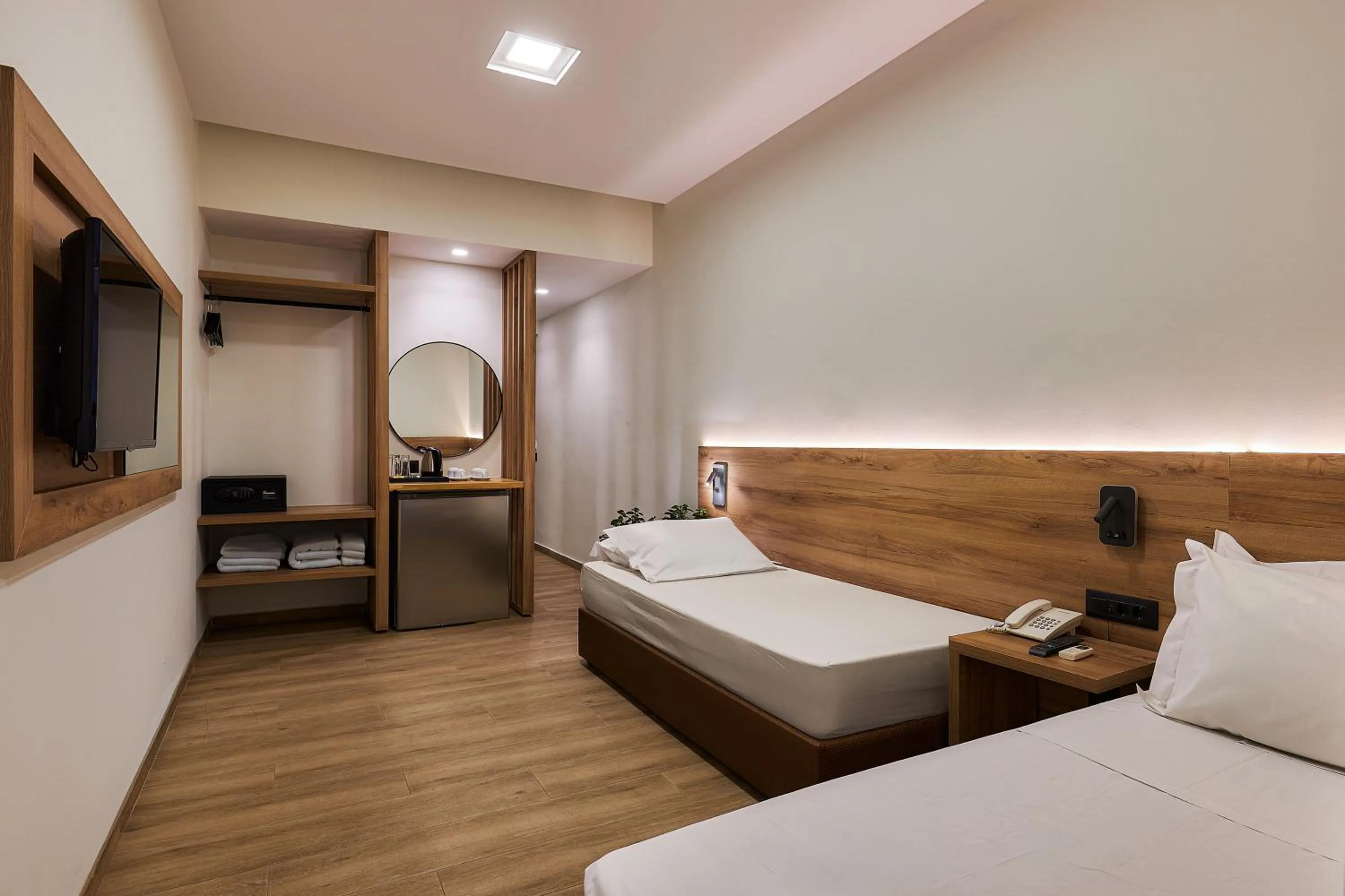 Bed in Dionisos Hotel