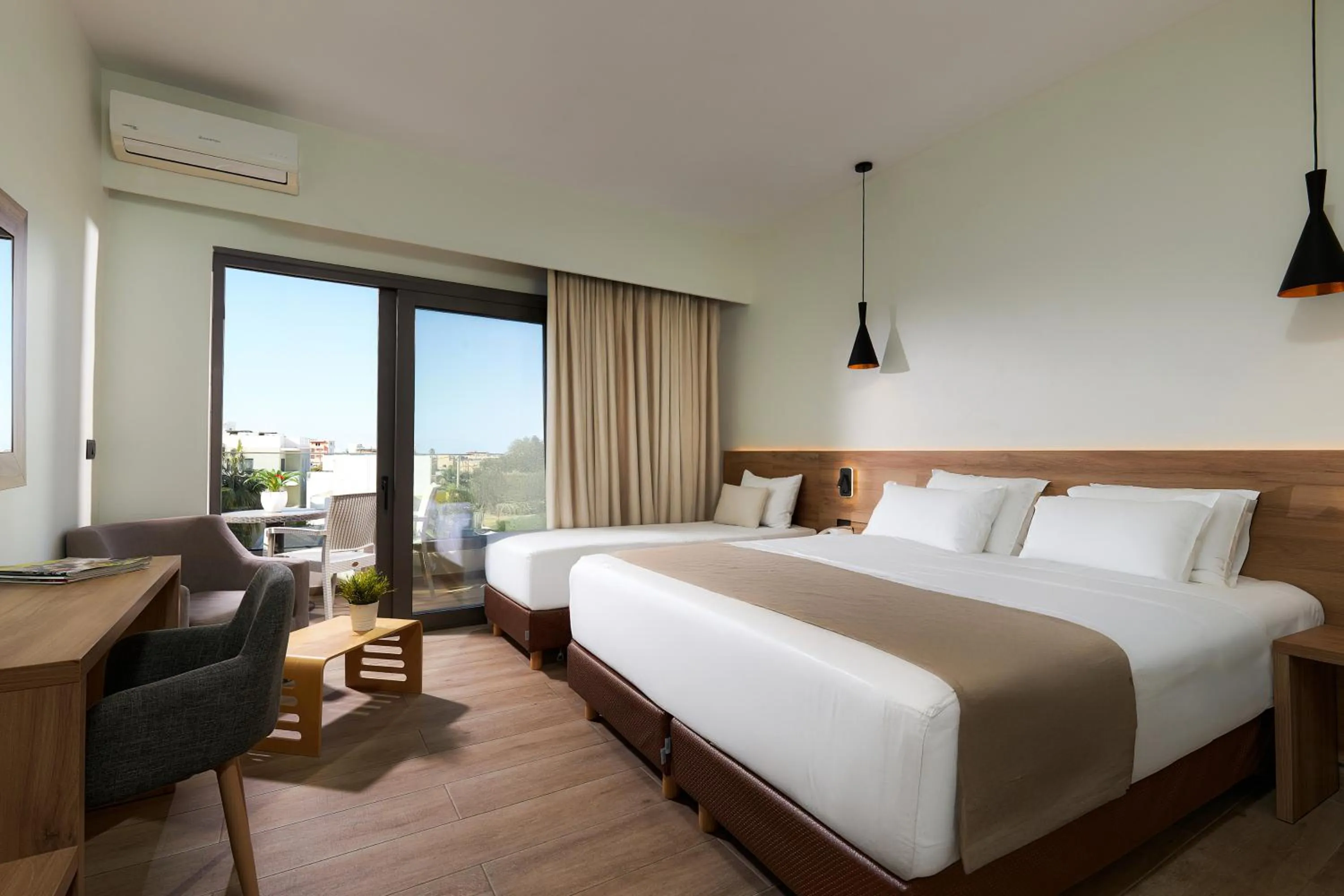 Bed in Dionisos Hotel