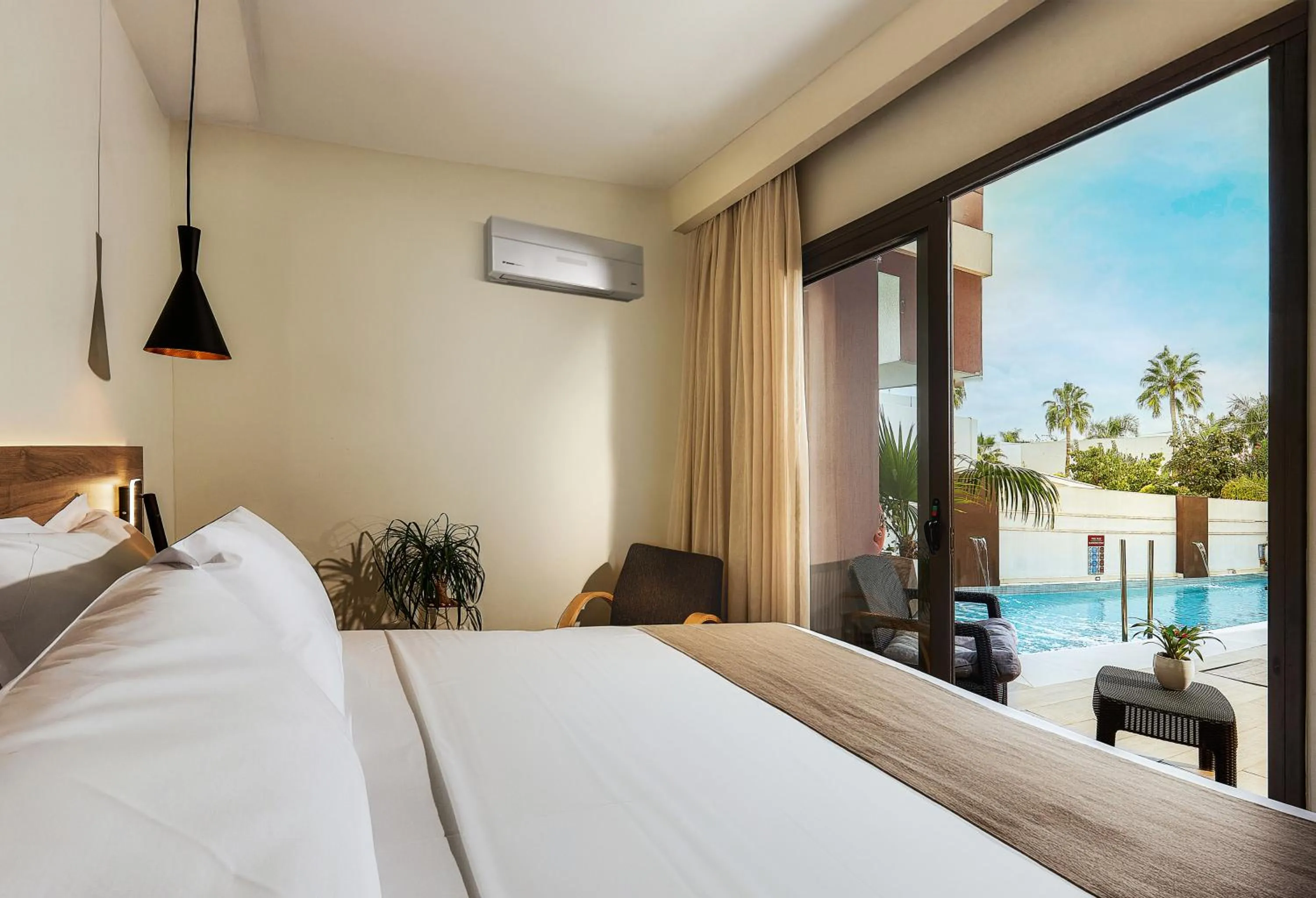 Bed in Dionisos Hotel