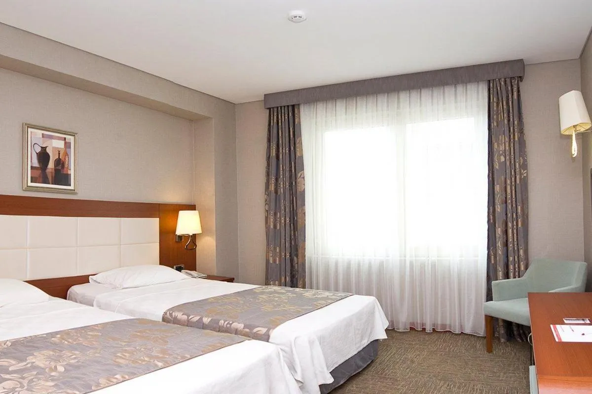 Bed in Innpera Hotel