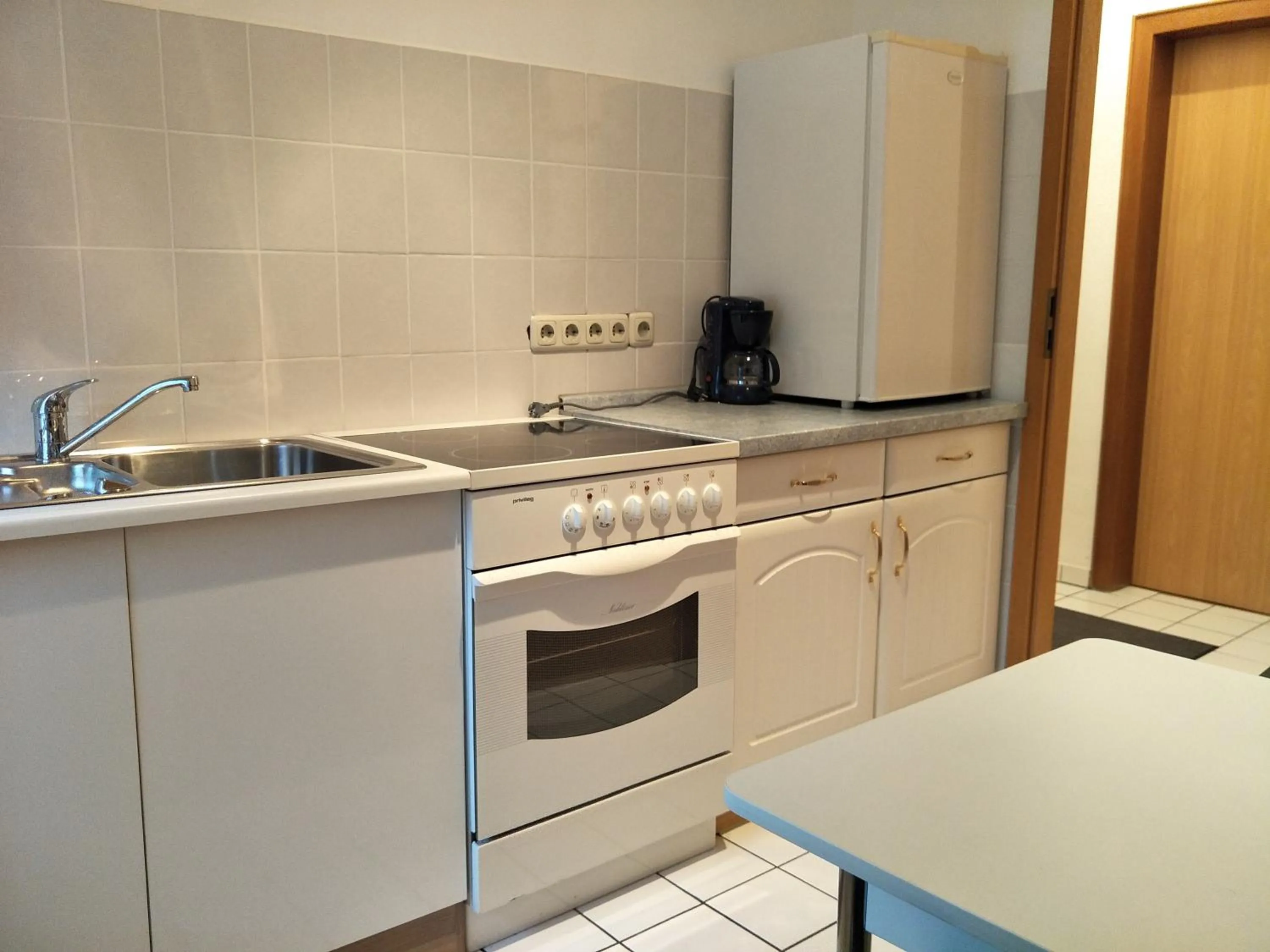 Kitchen or kitchenette in Hotel am Freihafen