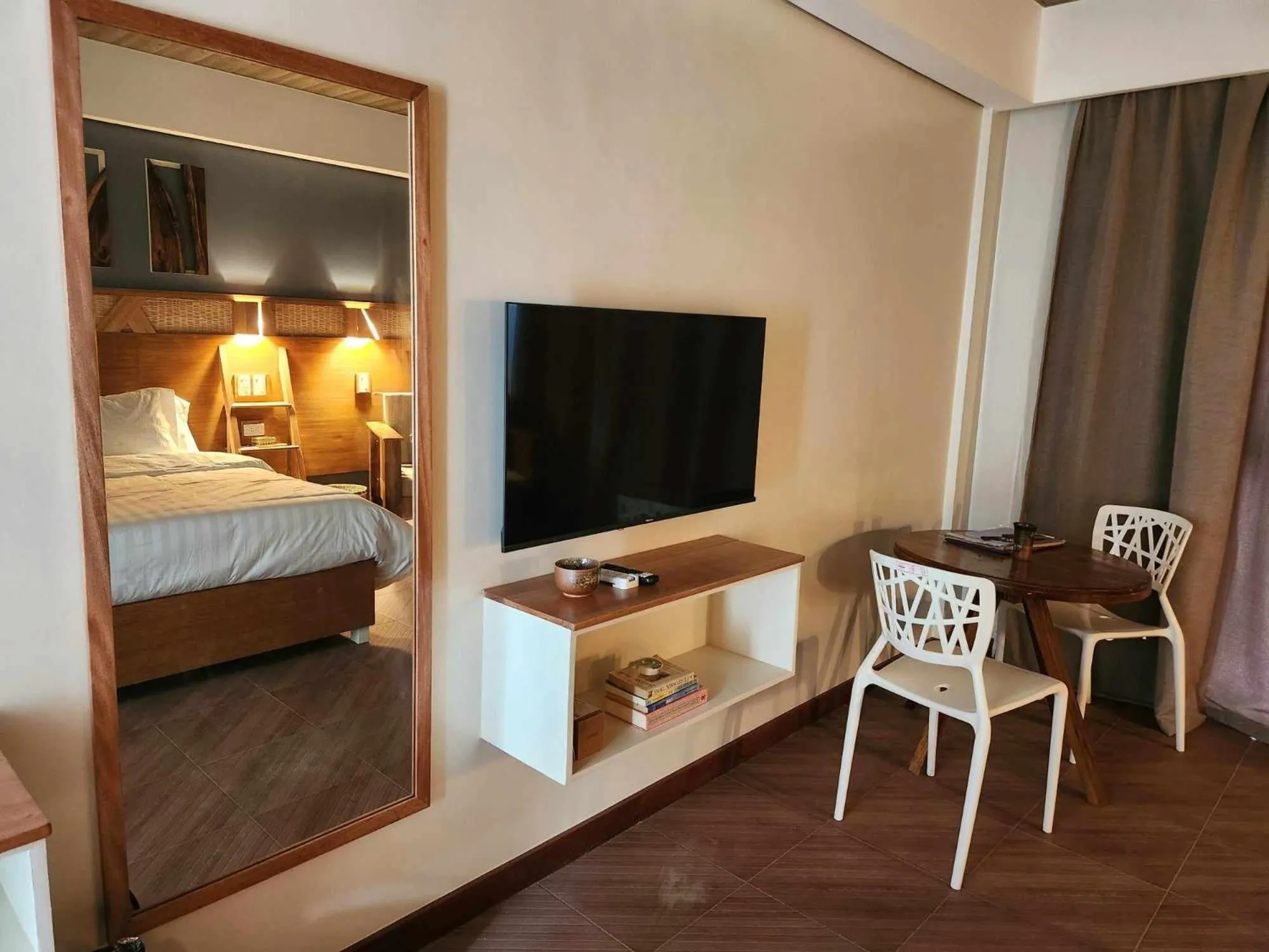 Bed in Acacia Garden Inn and Suites