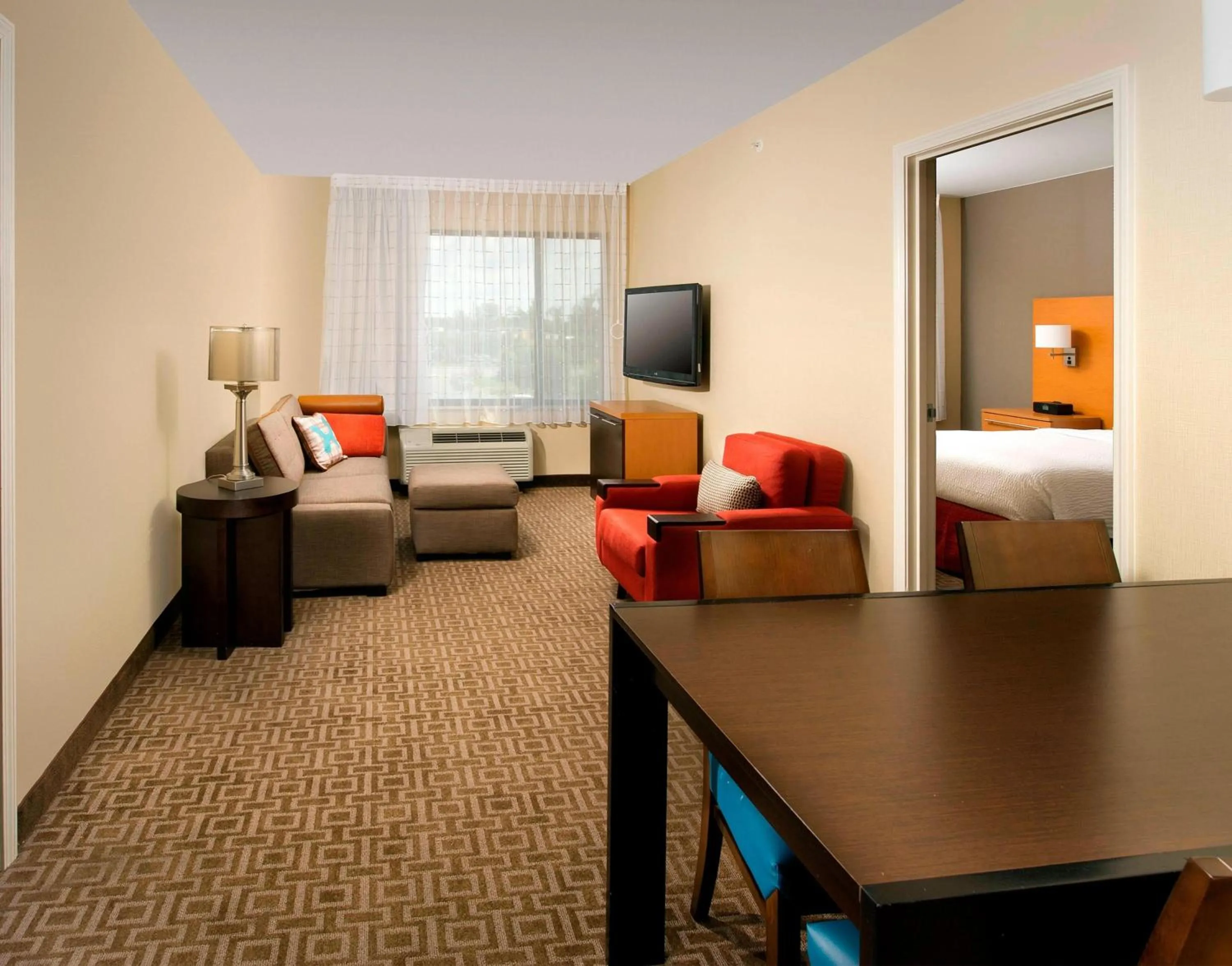 Living room, Bed in TownePlace Suites by Marriott Lexington Park Patuxent River Naval Air Station