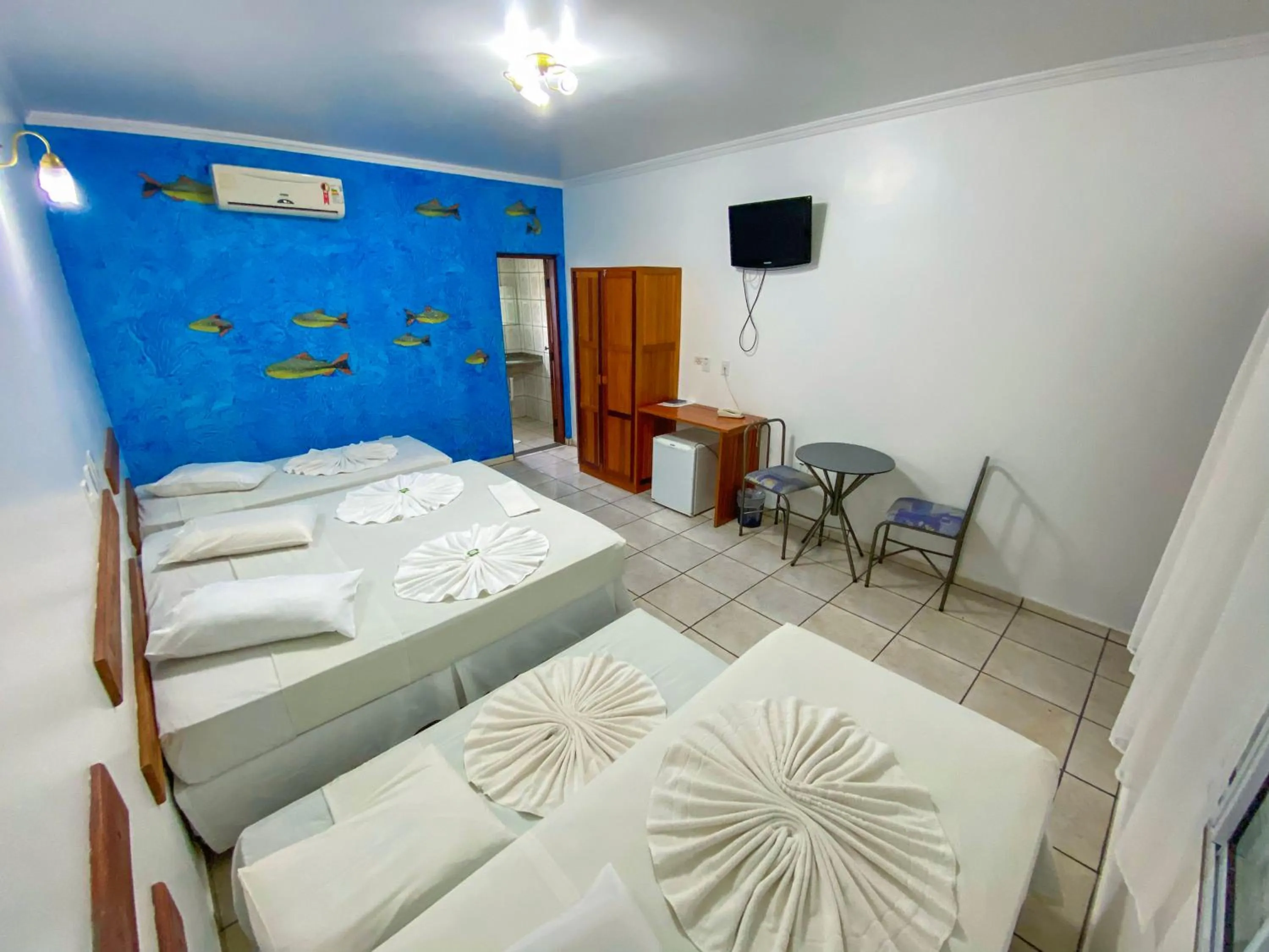 Photo of the whole room, Bed in Hotel Pousada Arauna