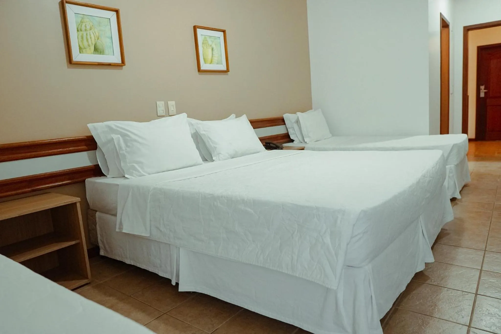 Bed in Sarana Praia Hotel