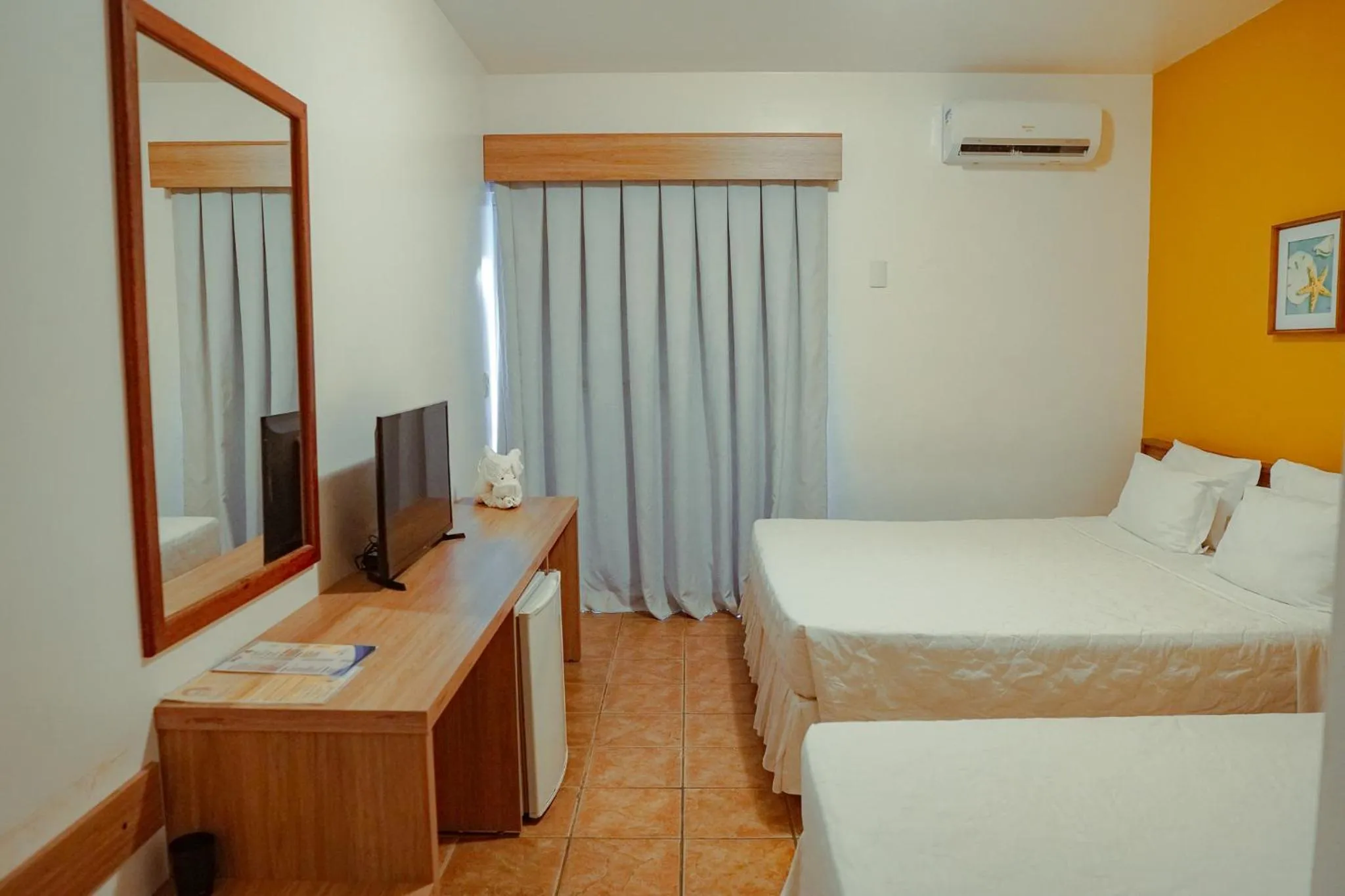 Bed in Sarana Praia Hotel