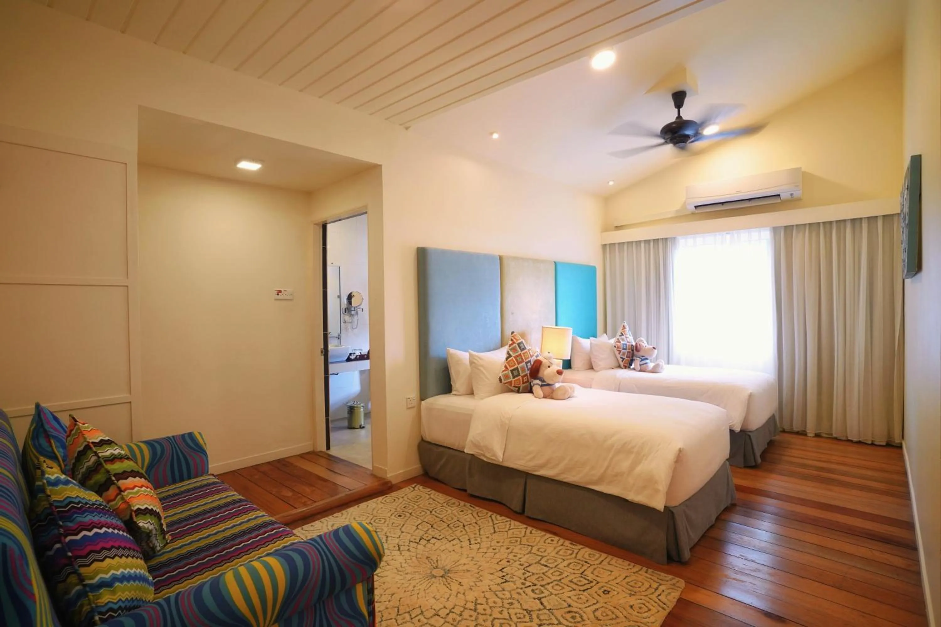 Bed in Sutera Sanctuary Lodges At Manukan Island