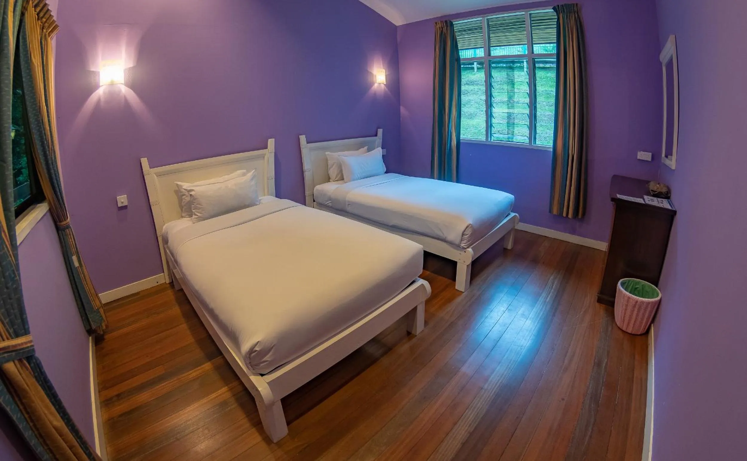 Bed in Sutera Sanctuary Lodges At Kinabalu Park