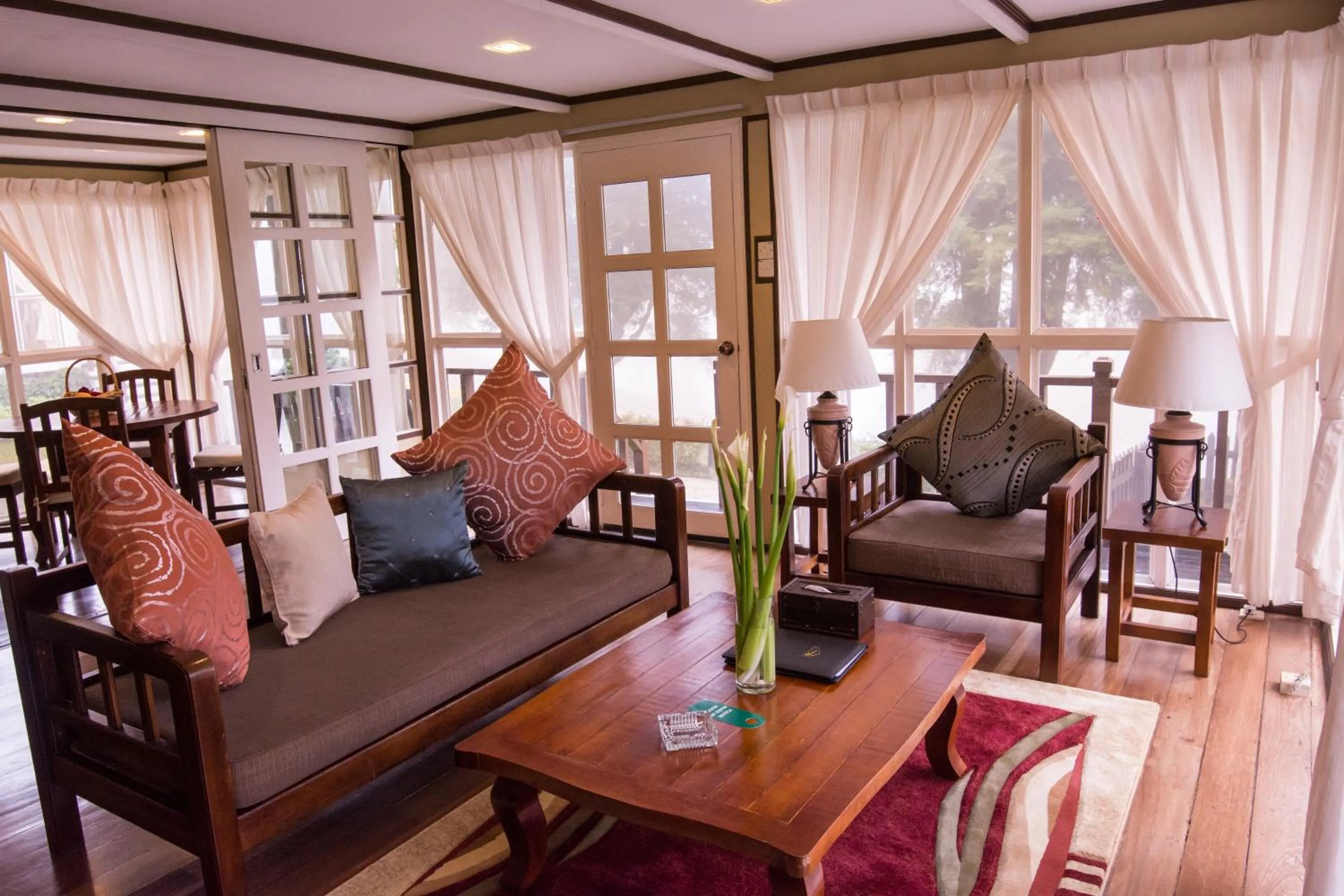 Living room in Sutera Sanctuary Lodges At Kinabalu Park