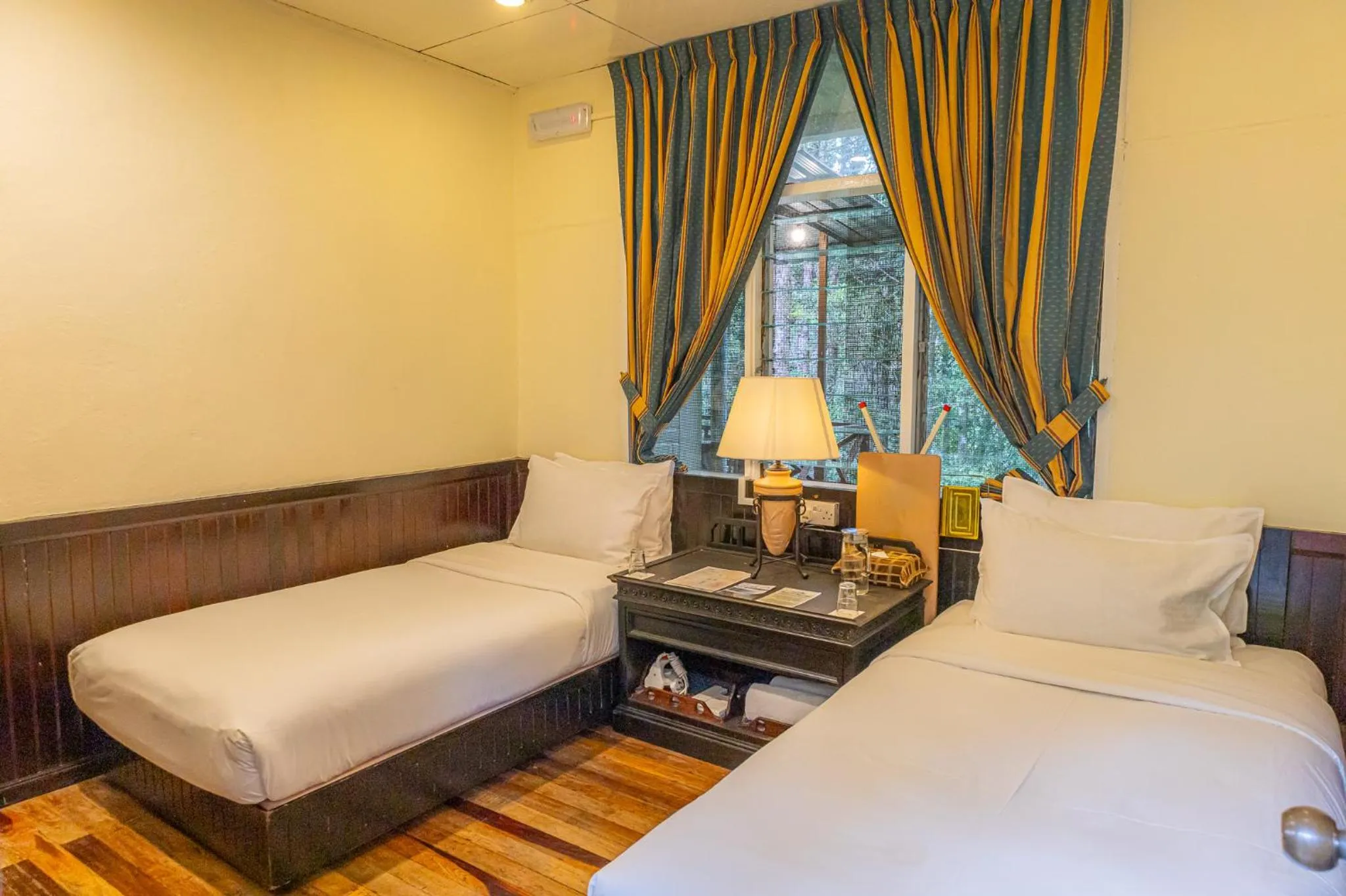 Bed in Sutera Sanctuary Lodges At Kinabalu Park