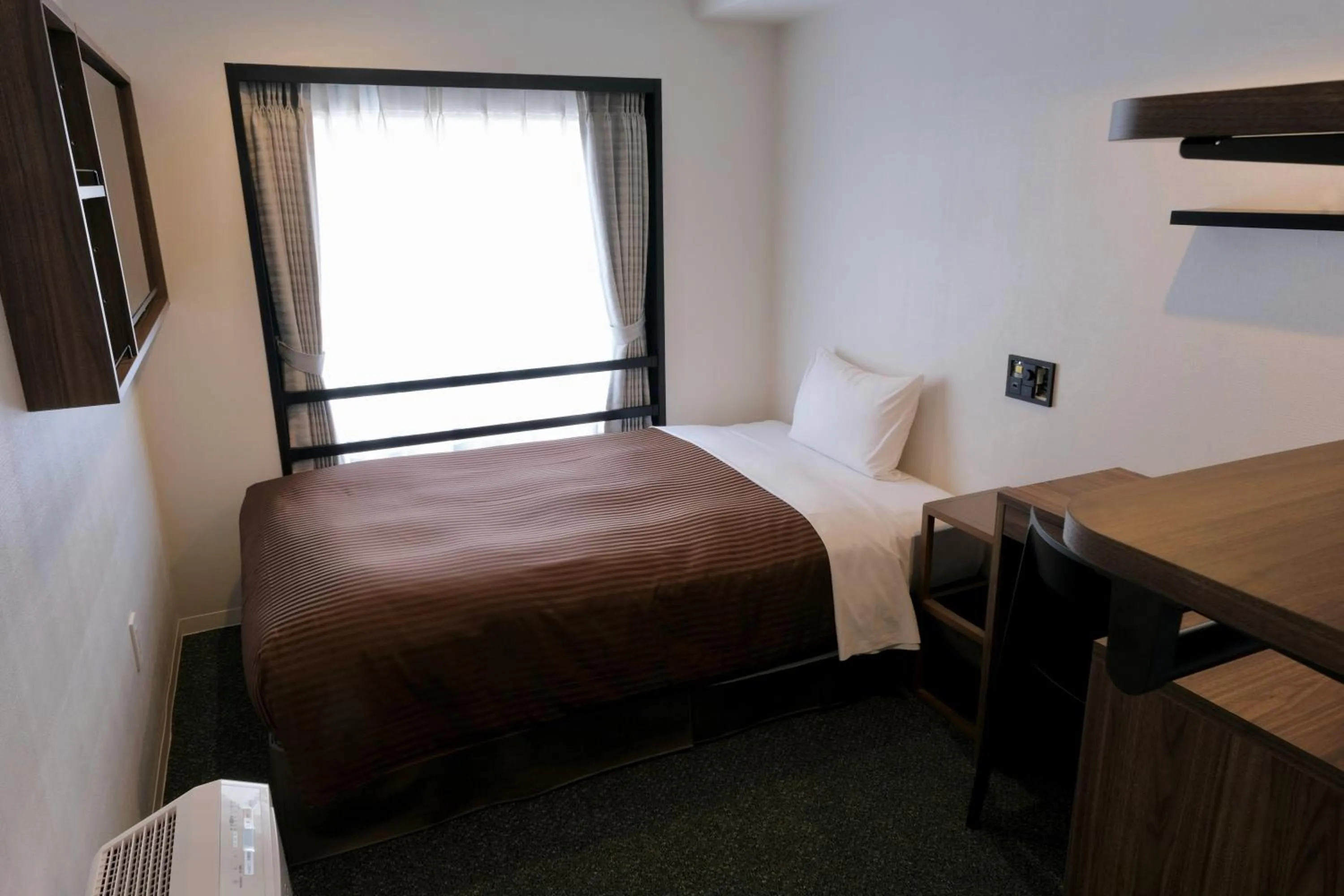 Bed in Belmont Hotel