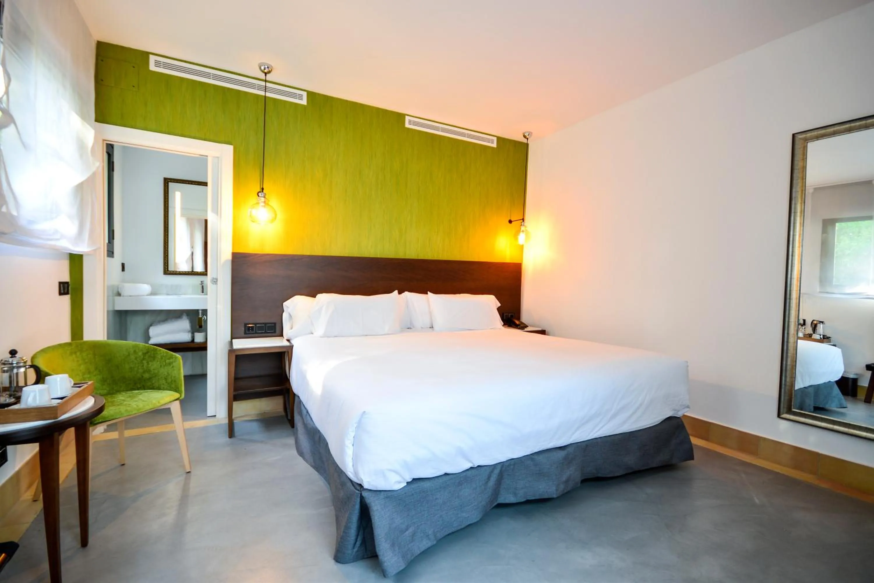 Bed in Legado Alcazar Hotel