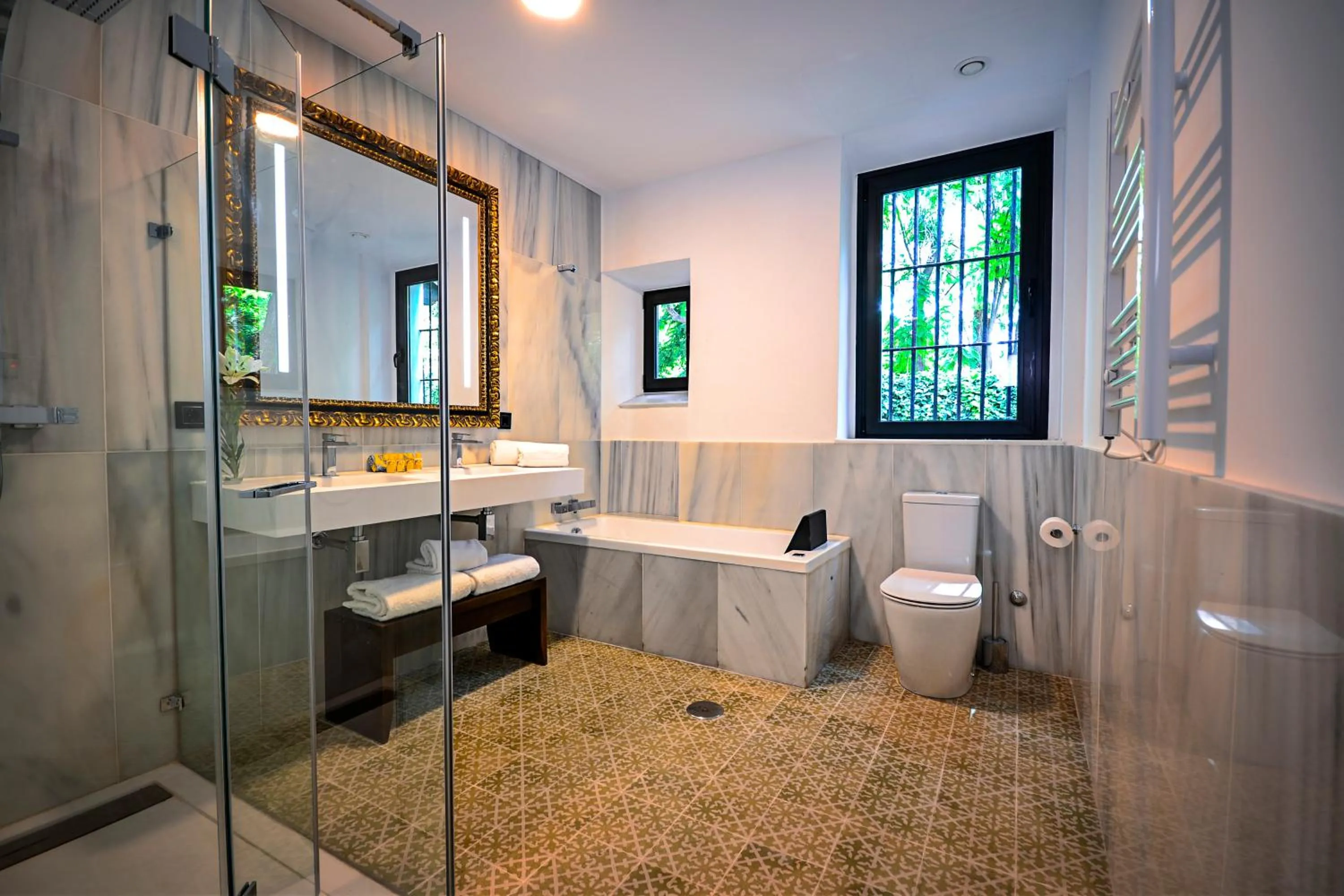 Toilet in Legado Alcazar Hotel