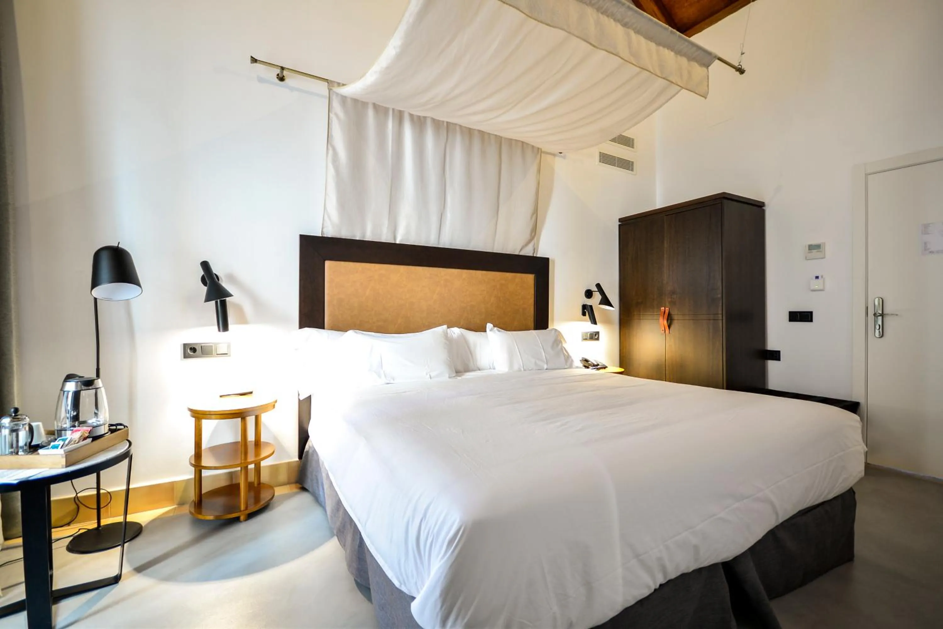 Bed in Legado Alcazar Hotel