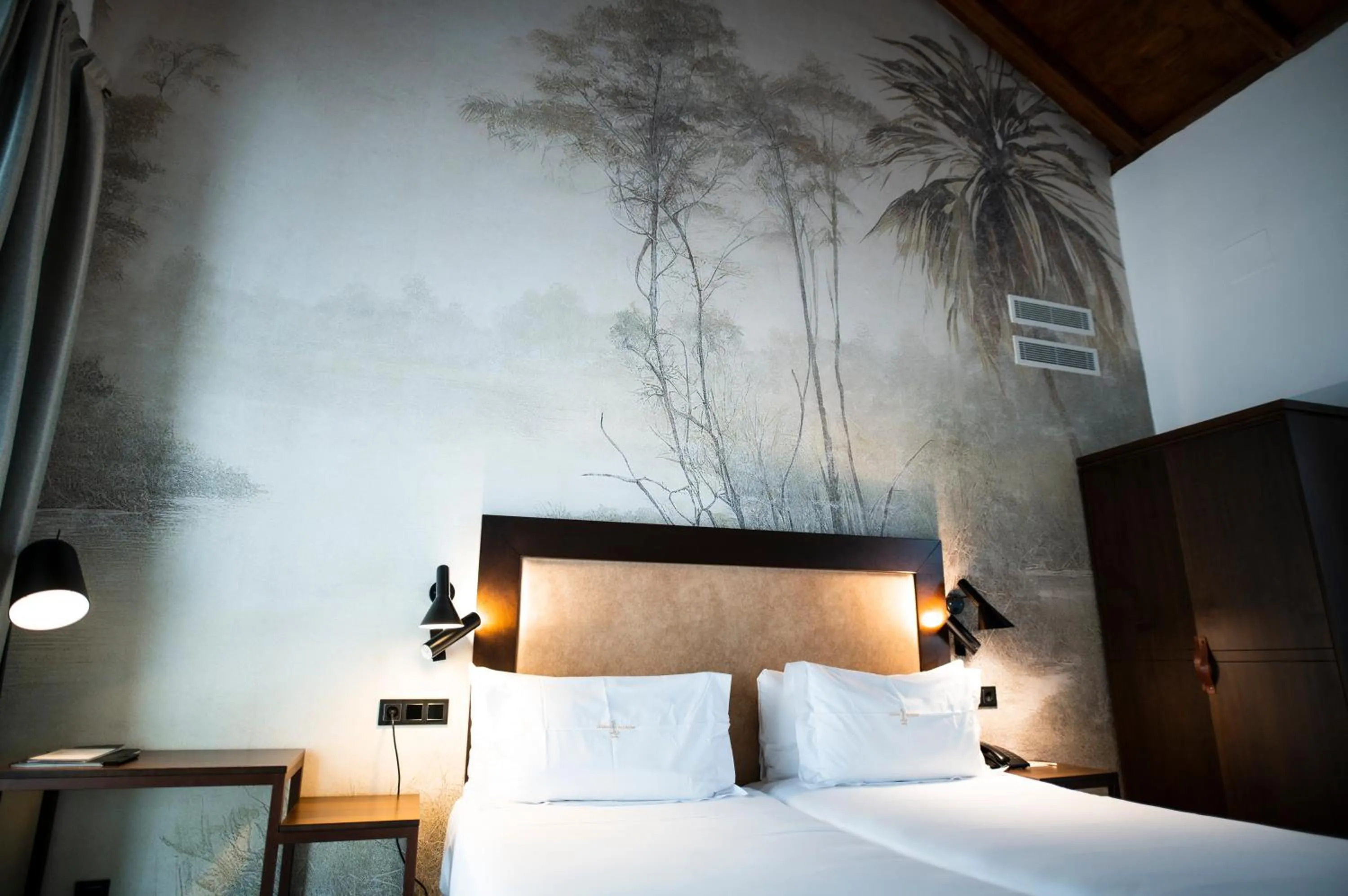 Bed in Legado Alcazar Hotel