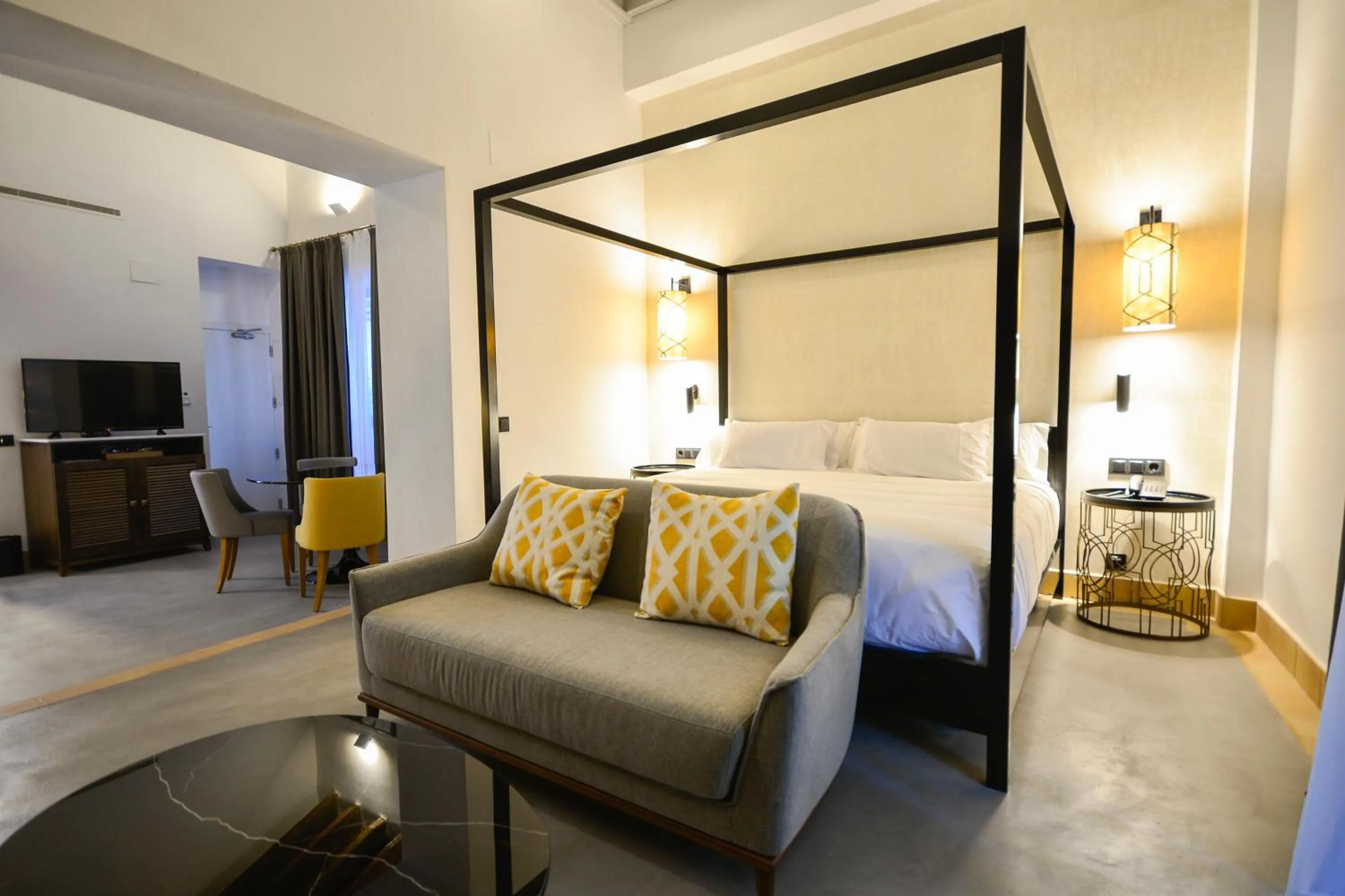 Bed in Legado Alcazar Hotel